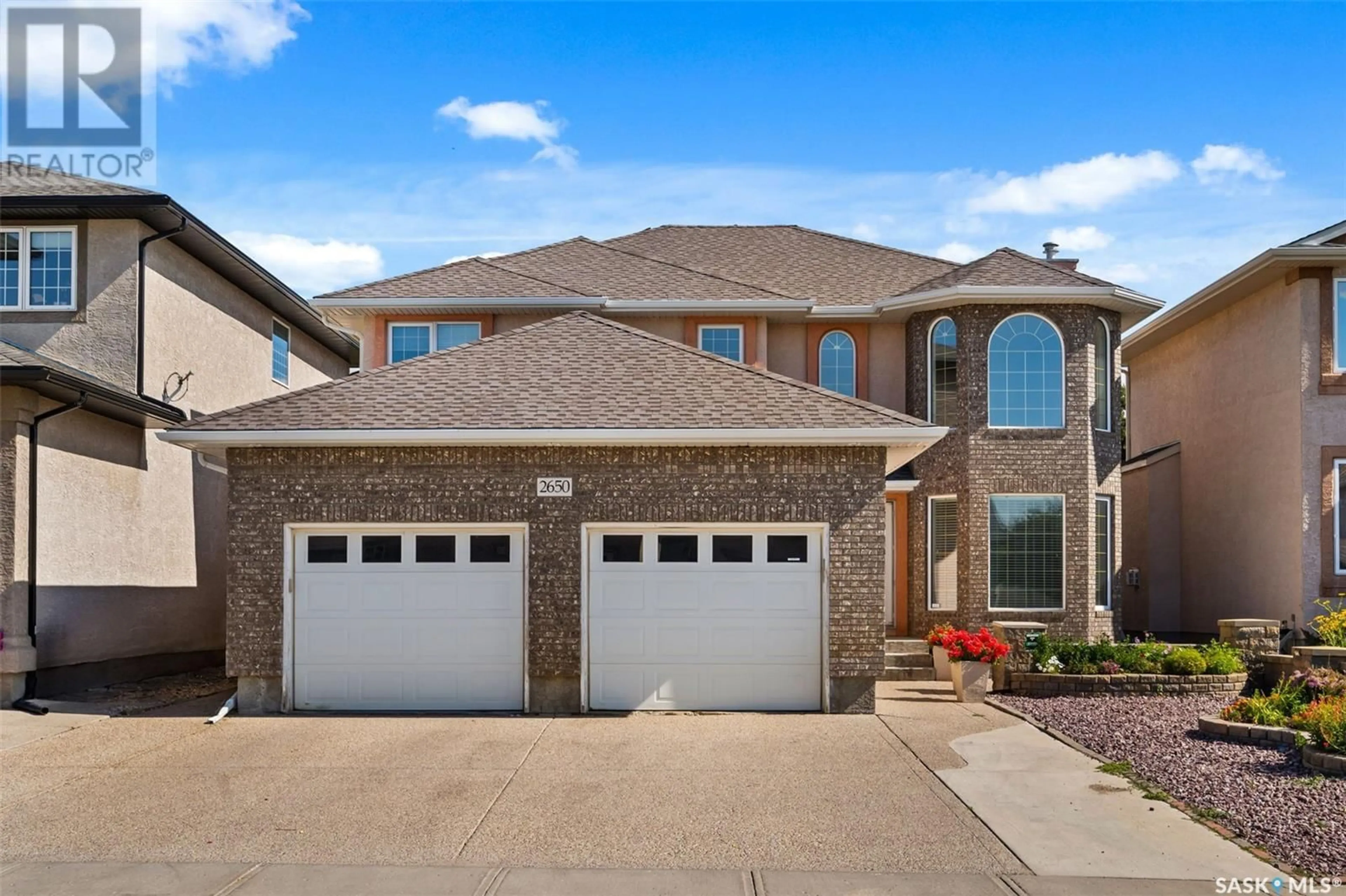 Home with brick exterior material for 2650 Sandringham CRESCENT, Regina Saskatchewan S4V3C6