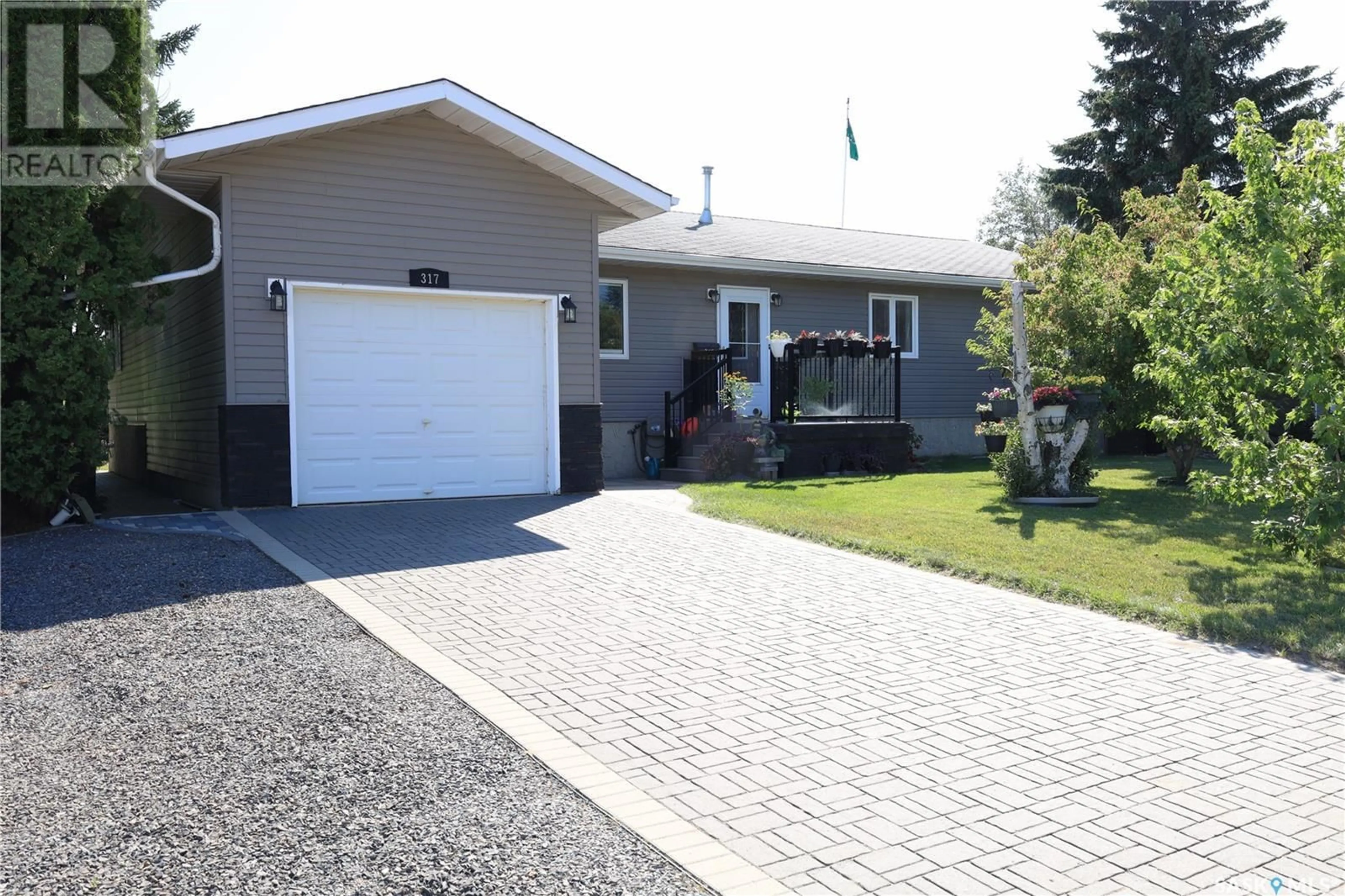 Home with vinyl exterior material for 317 Loeppky AVENUE, Dalmeny Saskatchewan S0K1E0