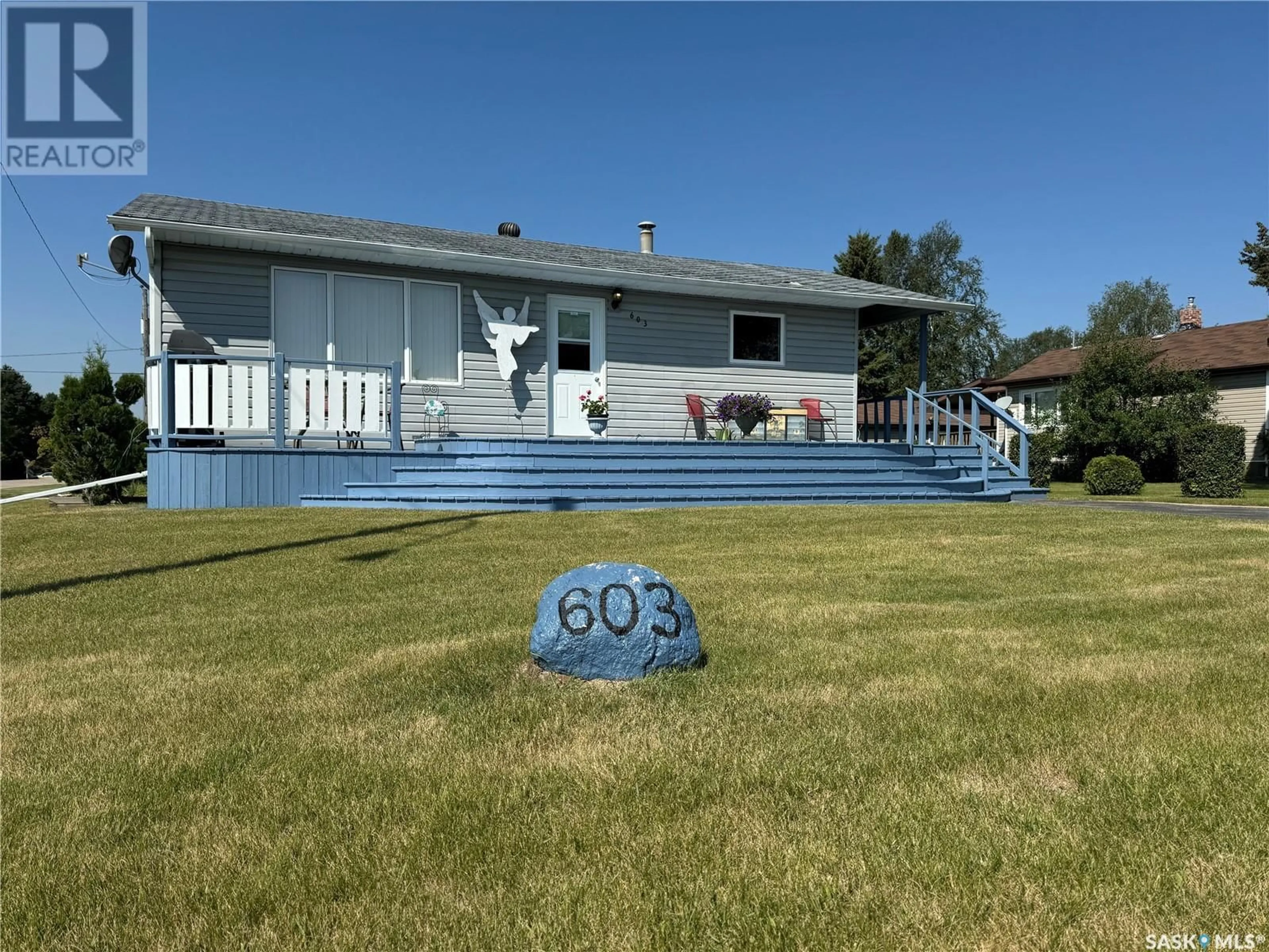 A pic from outside/outdoor area/front of a property/back of a property/a pic from drone, water/lake/river/ocean view for 603 2nd STREET NE, Preeceville Saskatchewan S0A3B0