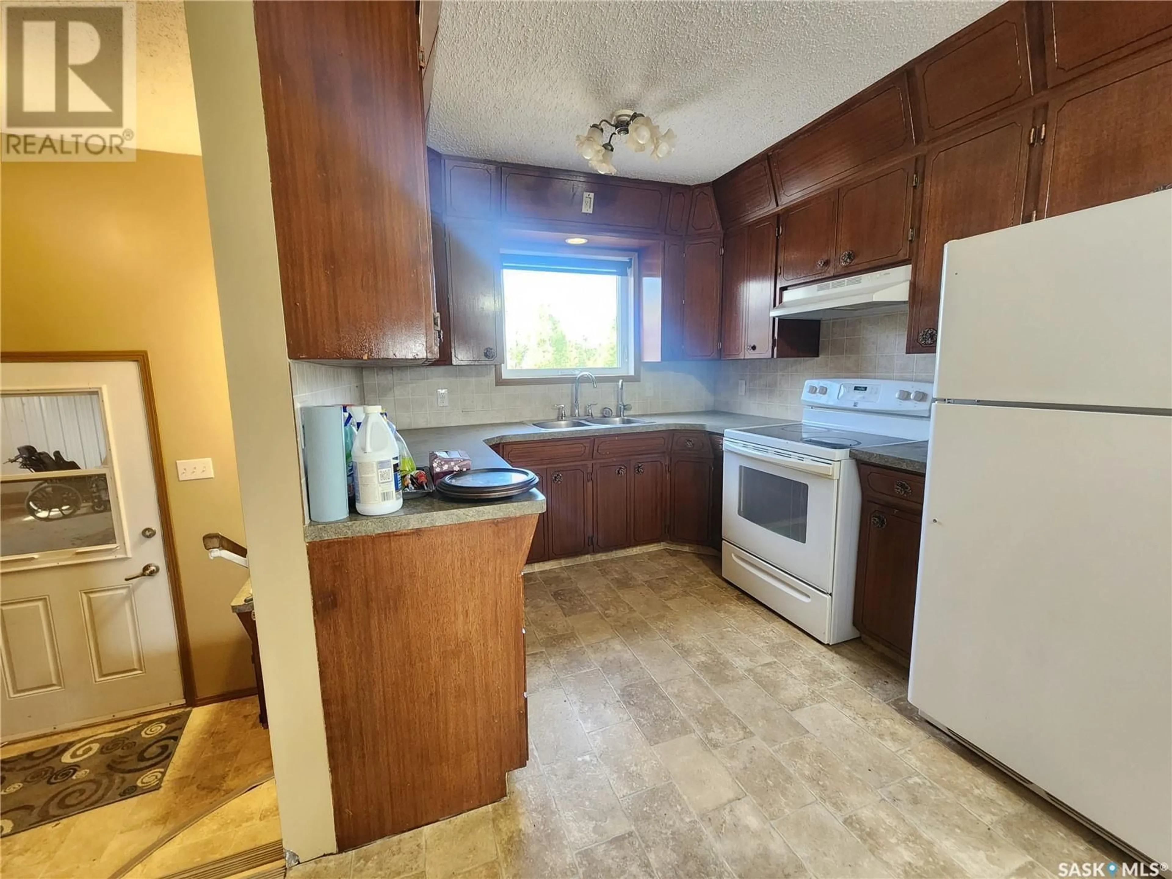 Standard kitchen, not visible floor, cottage for RM Weyburn Quarter, Weyburn Rm No. 67 Saskatchewan S4H2L2