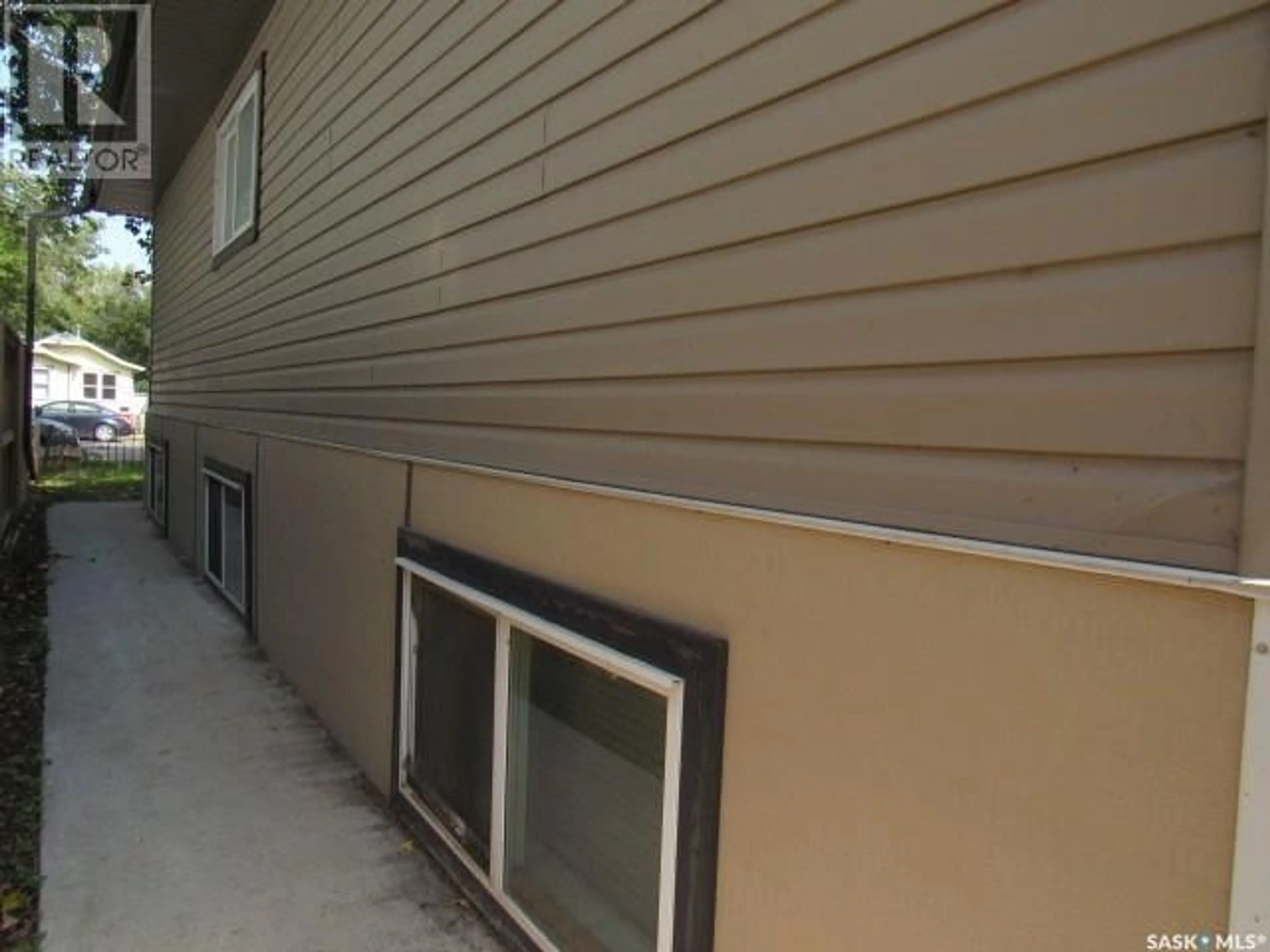 Home with vinyl exterior material, building for 1811 20th STREET W, Saskatoon Saskatchewan S7M1A1