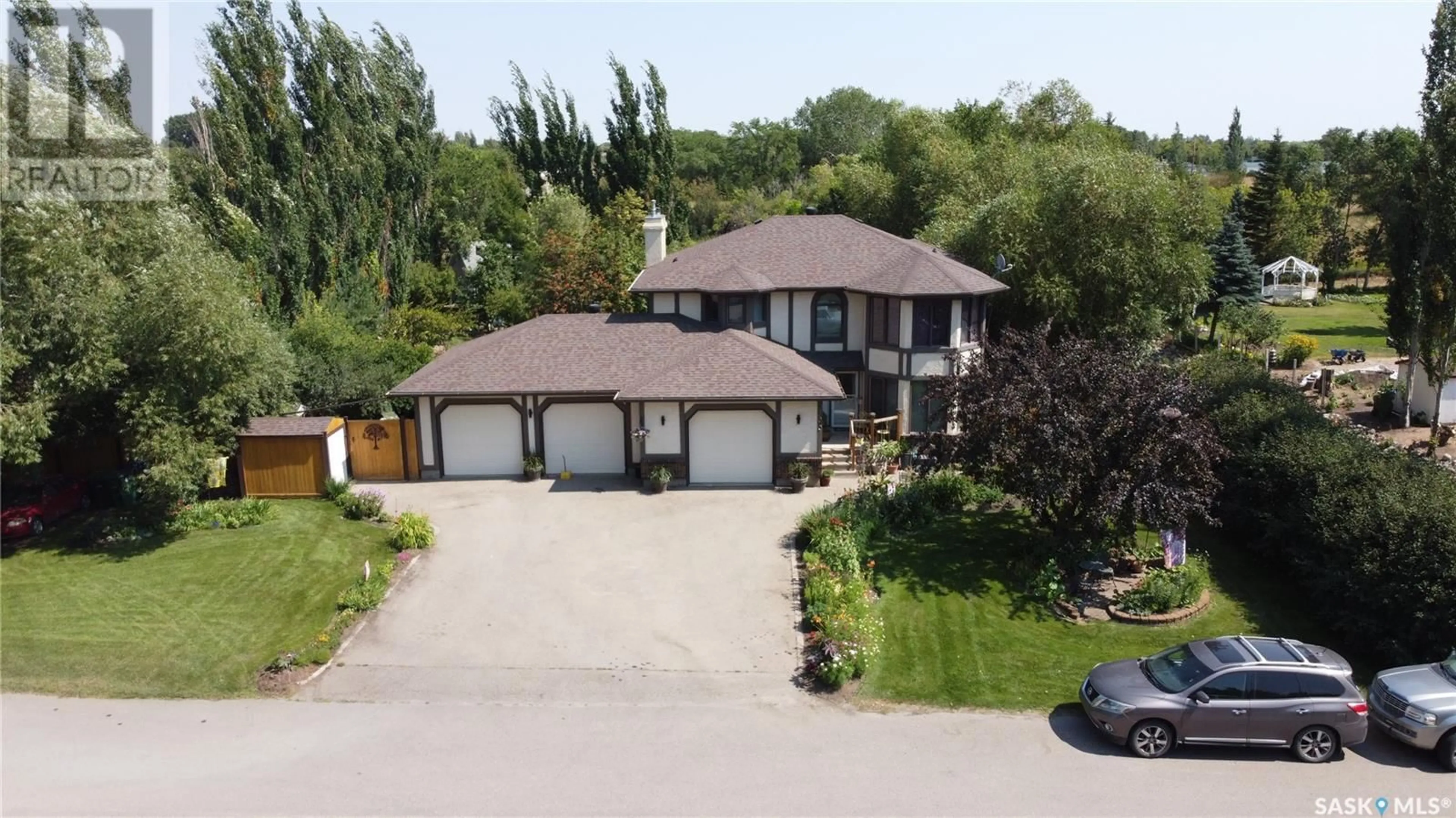 Frontside or backside of a home for 100 Scott PLACE, Pilot Butte Saskatchewan S0G3Z0