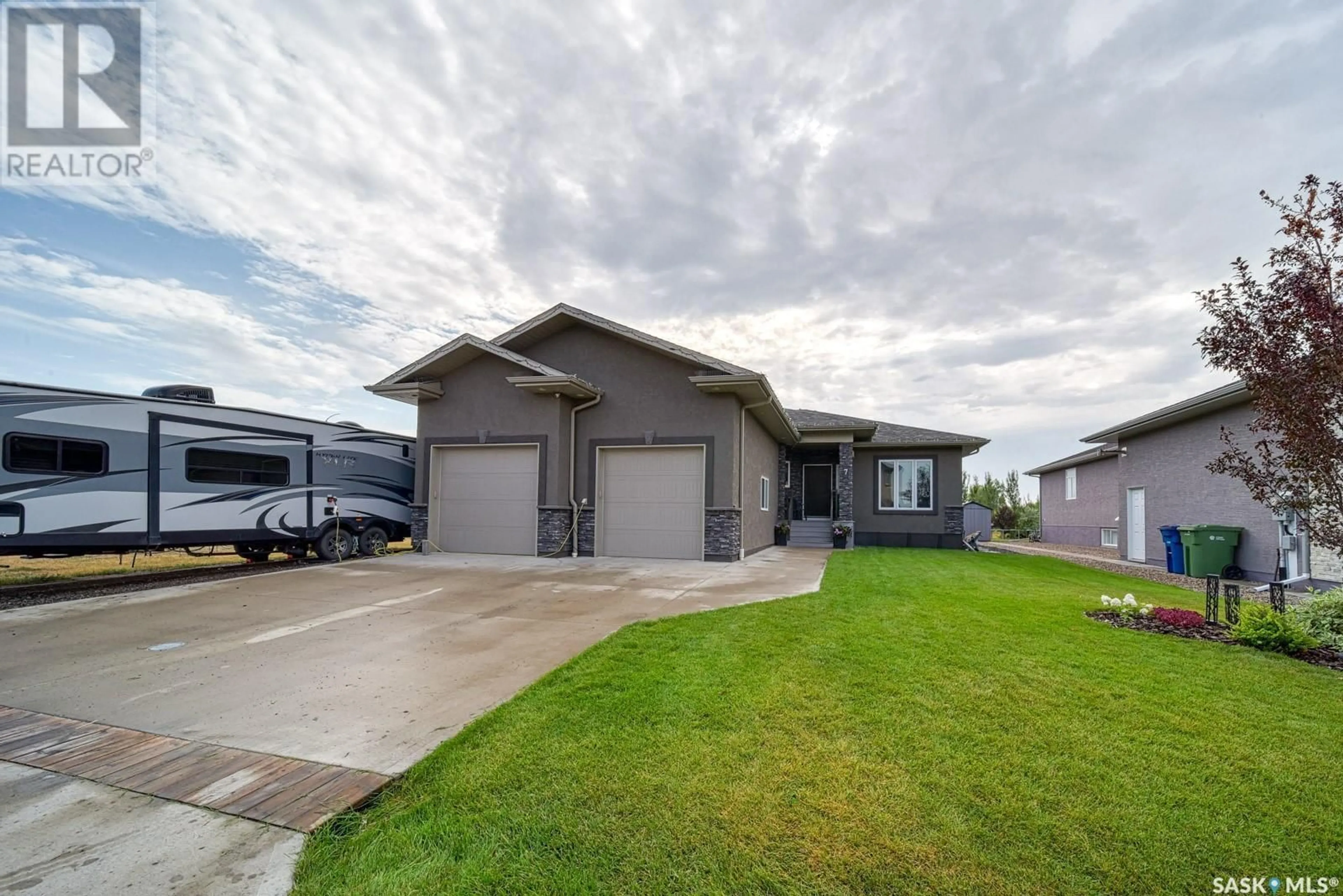 Frontside or backside of a home for 7 McKenzie LANDING, White City Saskatchewan S4L0B2