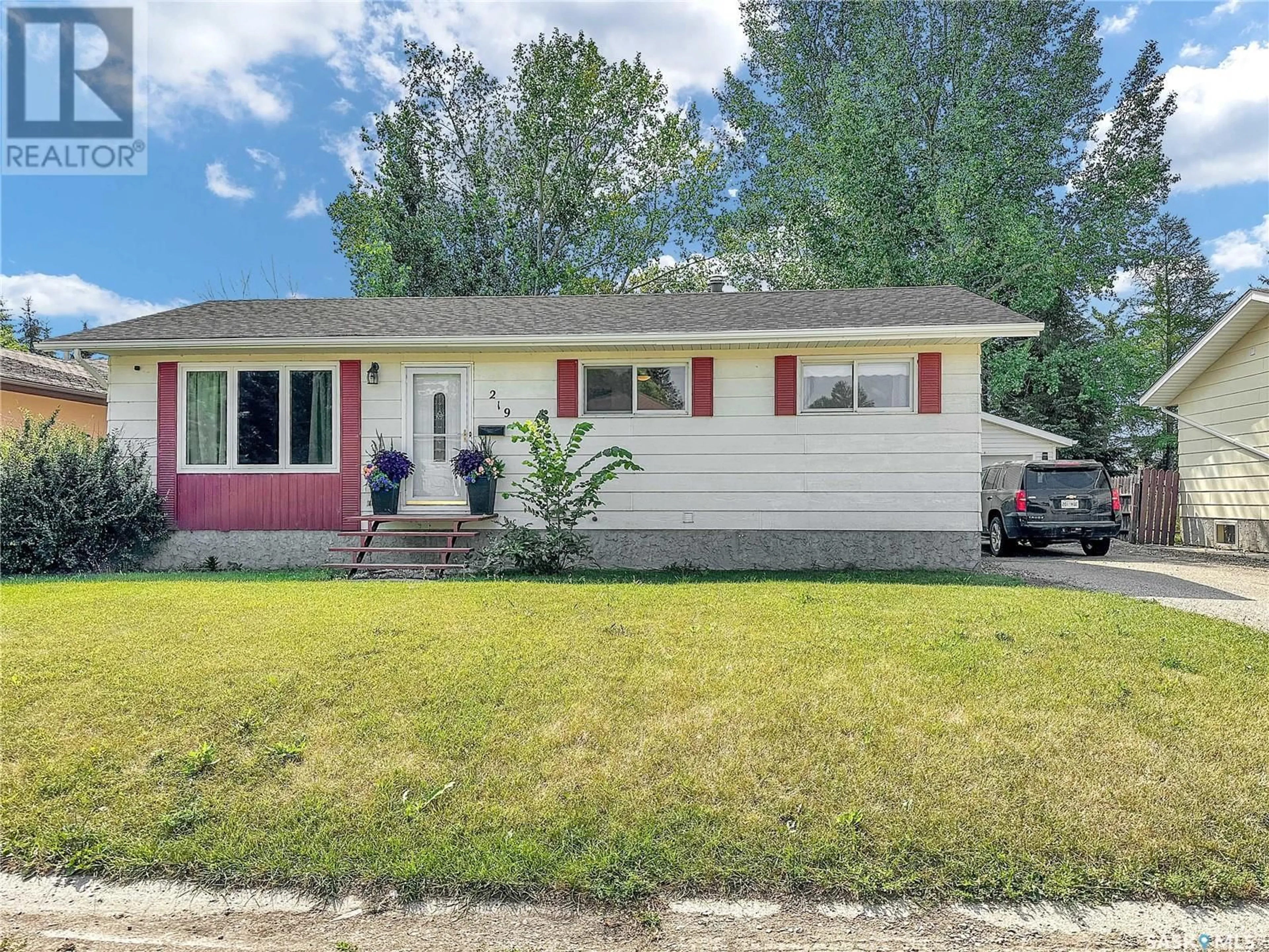 Home with vinyl exterior material, street for 219 4TH AVENUE, Whitewood Saskatchewan S0G5C0