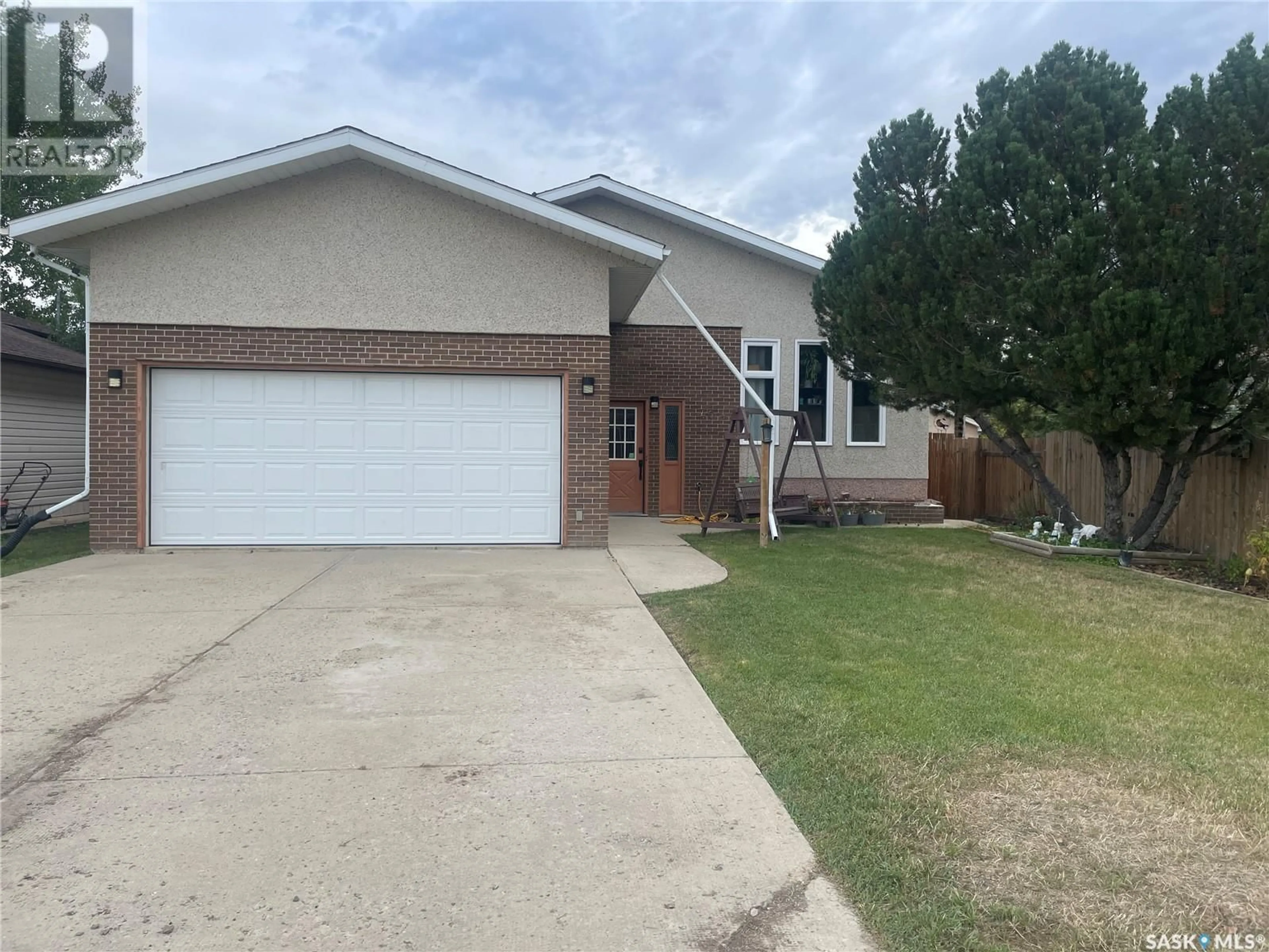 Home with brick exterior material, street for 404 PARSONS AVENUE, Maple Creek Saskatchewan S0N1N0