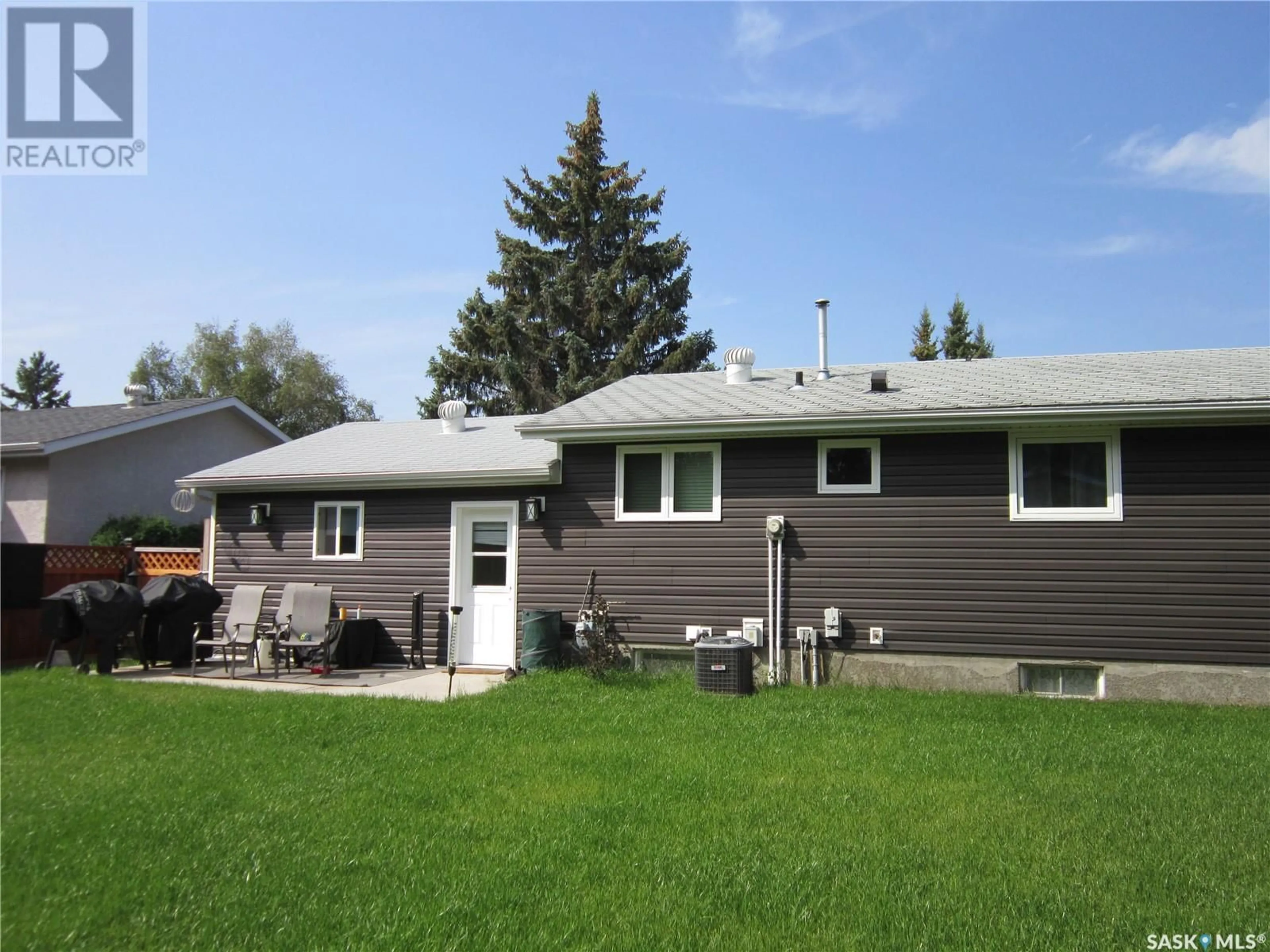 Home with vinyl exterior material for 1107 Centre STREET, Nipawin Saskatchewan S0E1E0