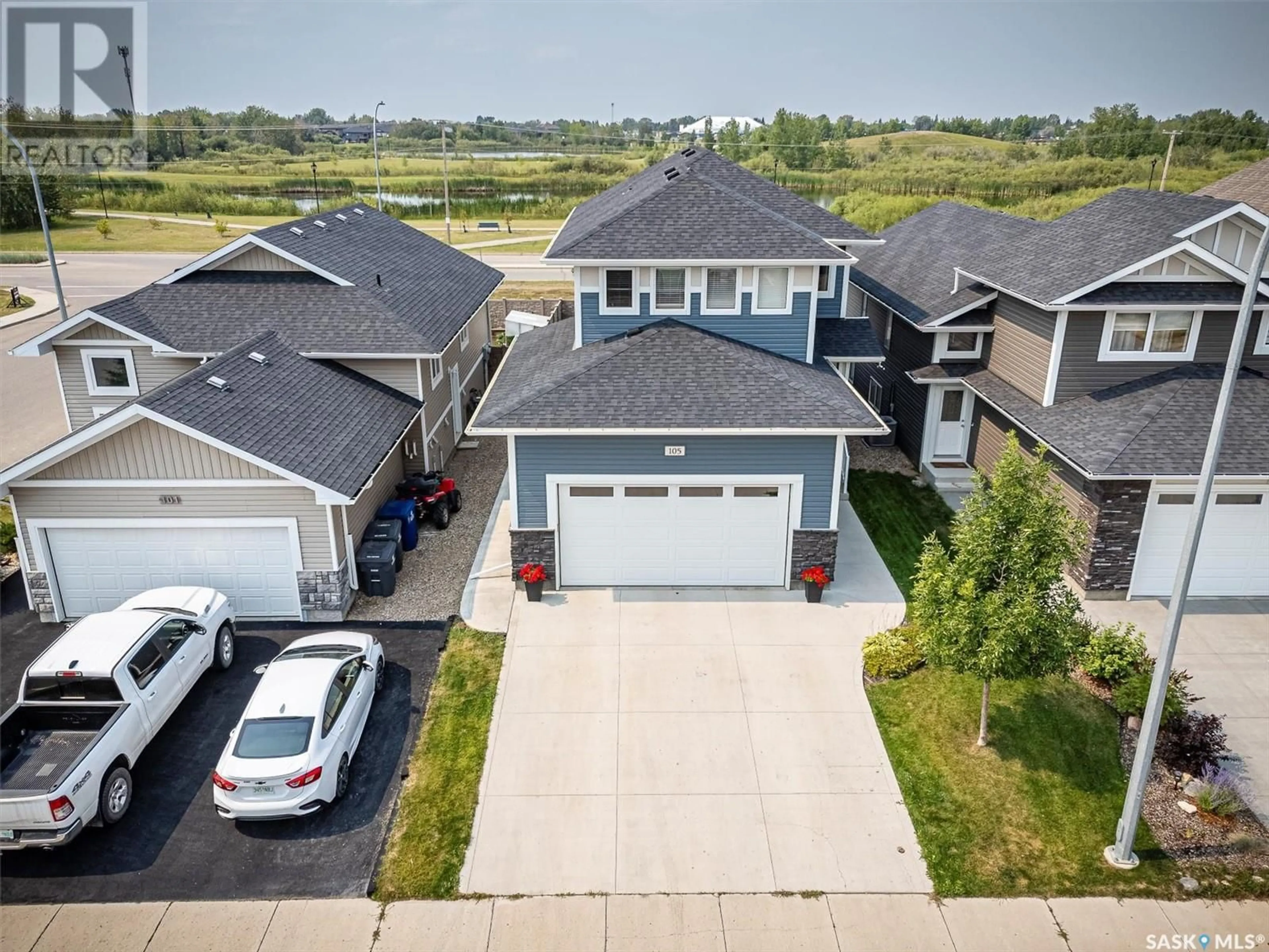 Frontside or backside of a home for 105 Cowan CRESCENT, Martensville Saskatchewan S0K2T1