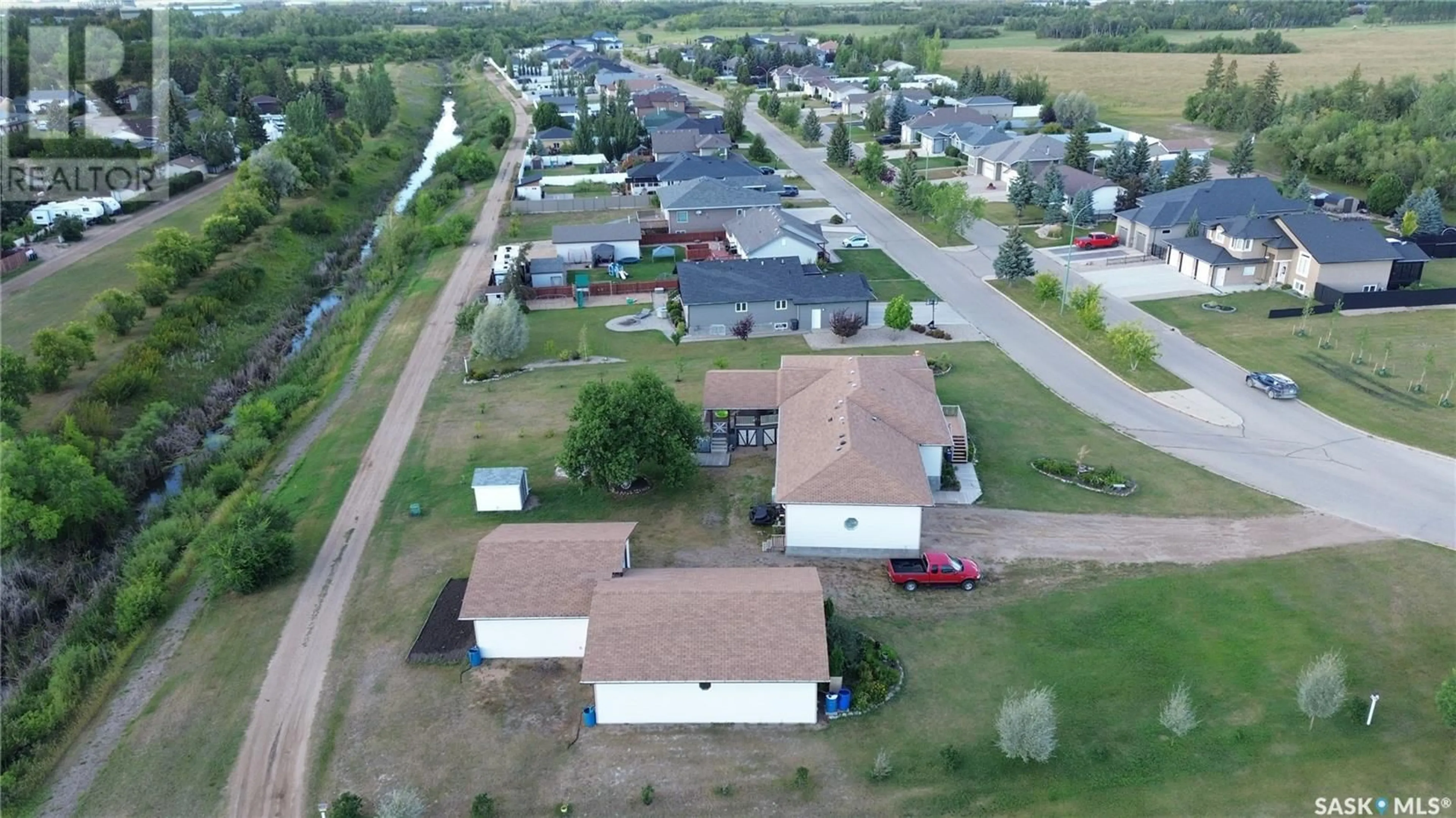 A pic from outside/outdoor area/front of a property/back of a property/a pic from drone, street for 1 PARK BOULEVARD, Melville Saskatchewan S0A2P0