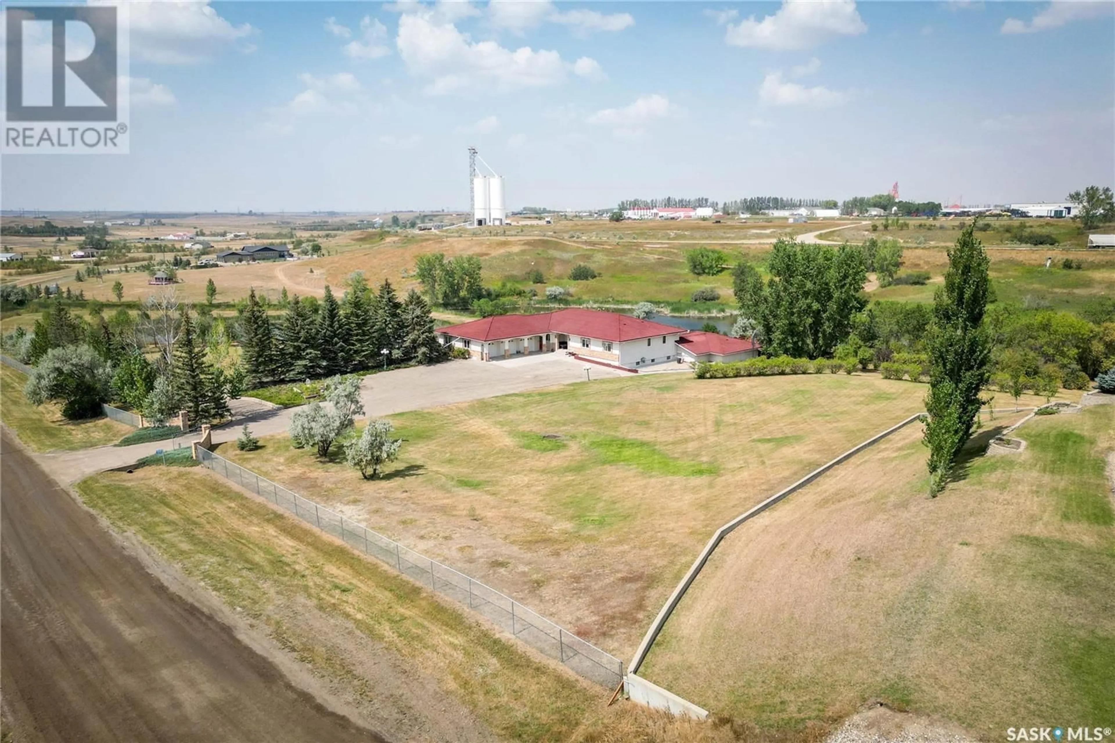 A pic from exterior of the house or condo, the fenced backyard for Heier Acreage, Estevan Rm No. 5 Saskatchewan S4A2L7