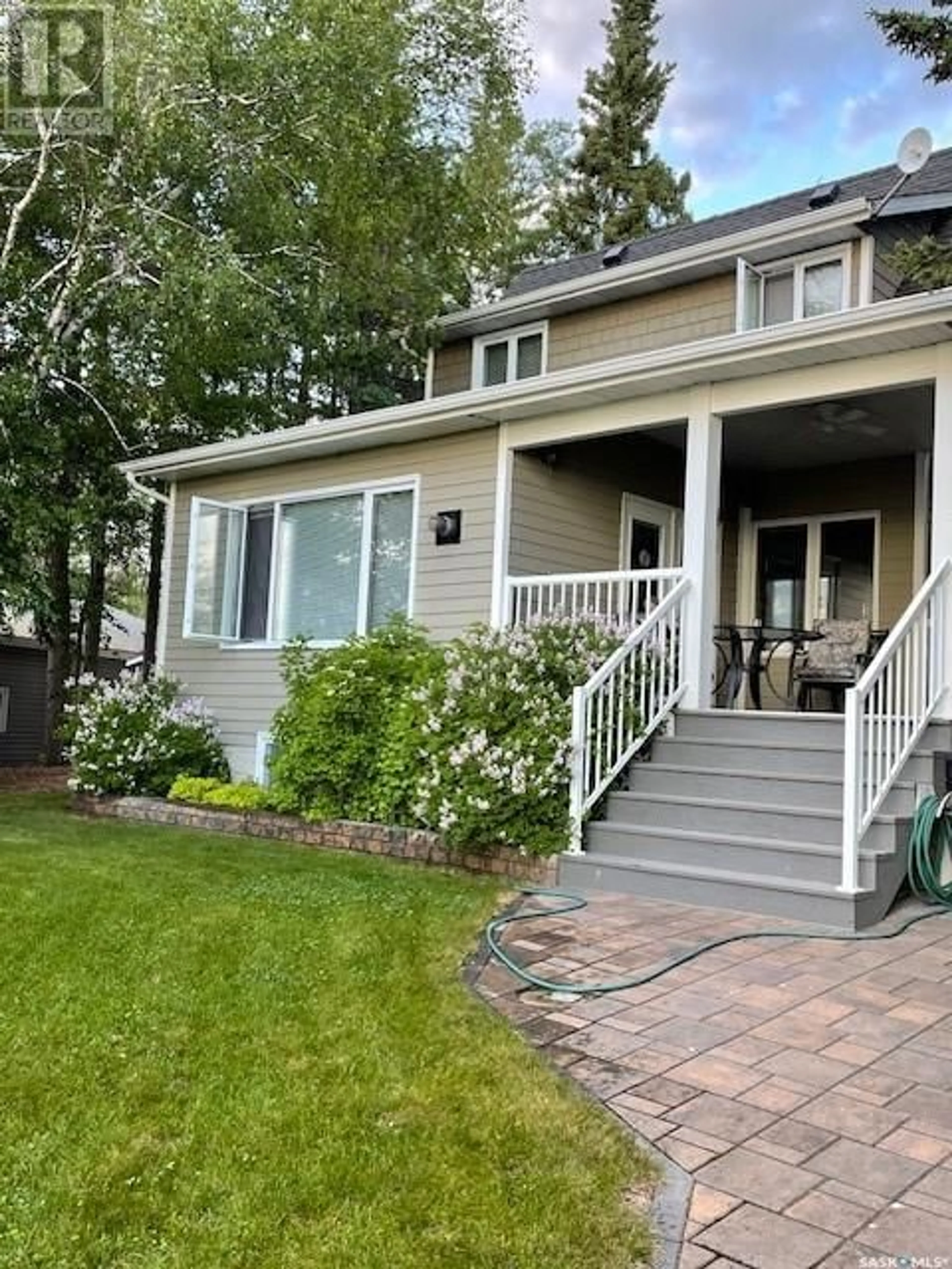 Home with vinyl exterior material, street for 112 BIRCH DRIVE, Turtle Lake Saskatchewan S0M0Y0