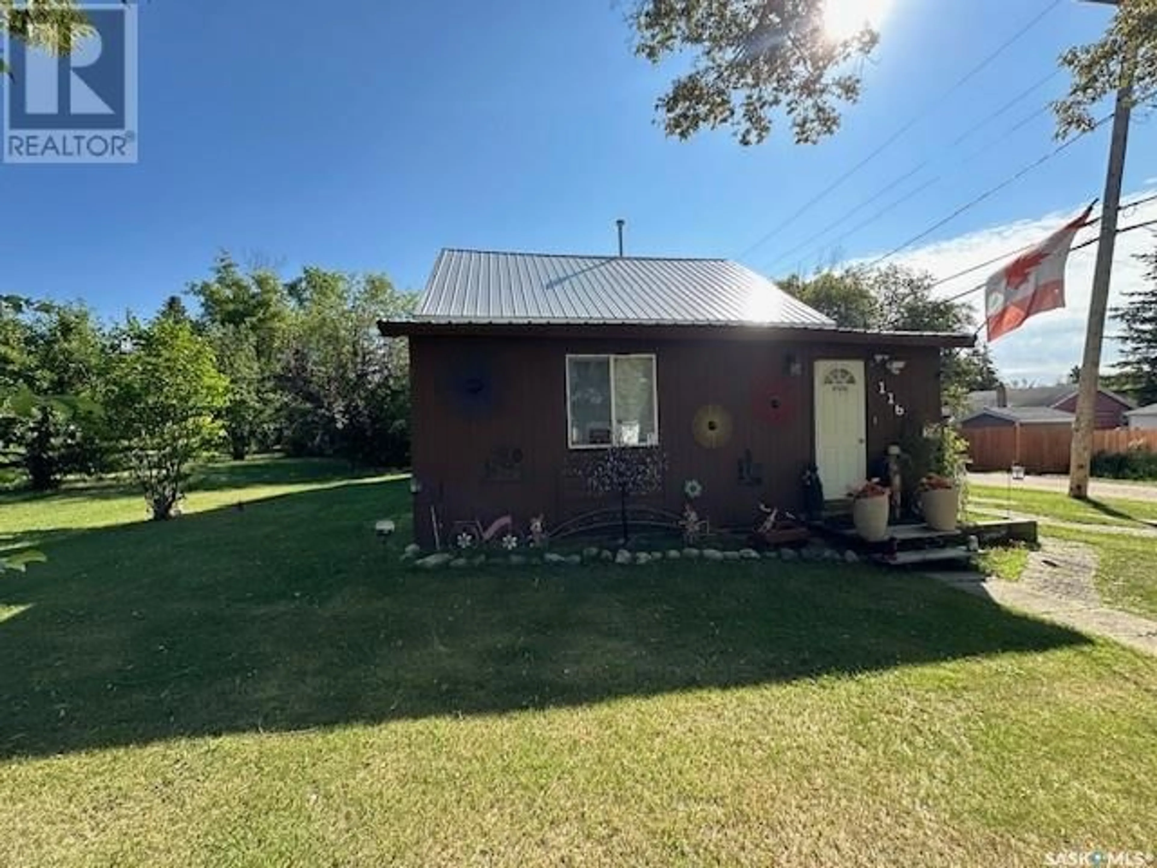 A pic from outside/outdoor area/front of a property/back of a property/a pic from drone, building for 116 CARMENT AVENUE, Kamsack Saskatchewan S0A1S0