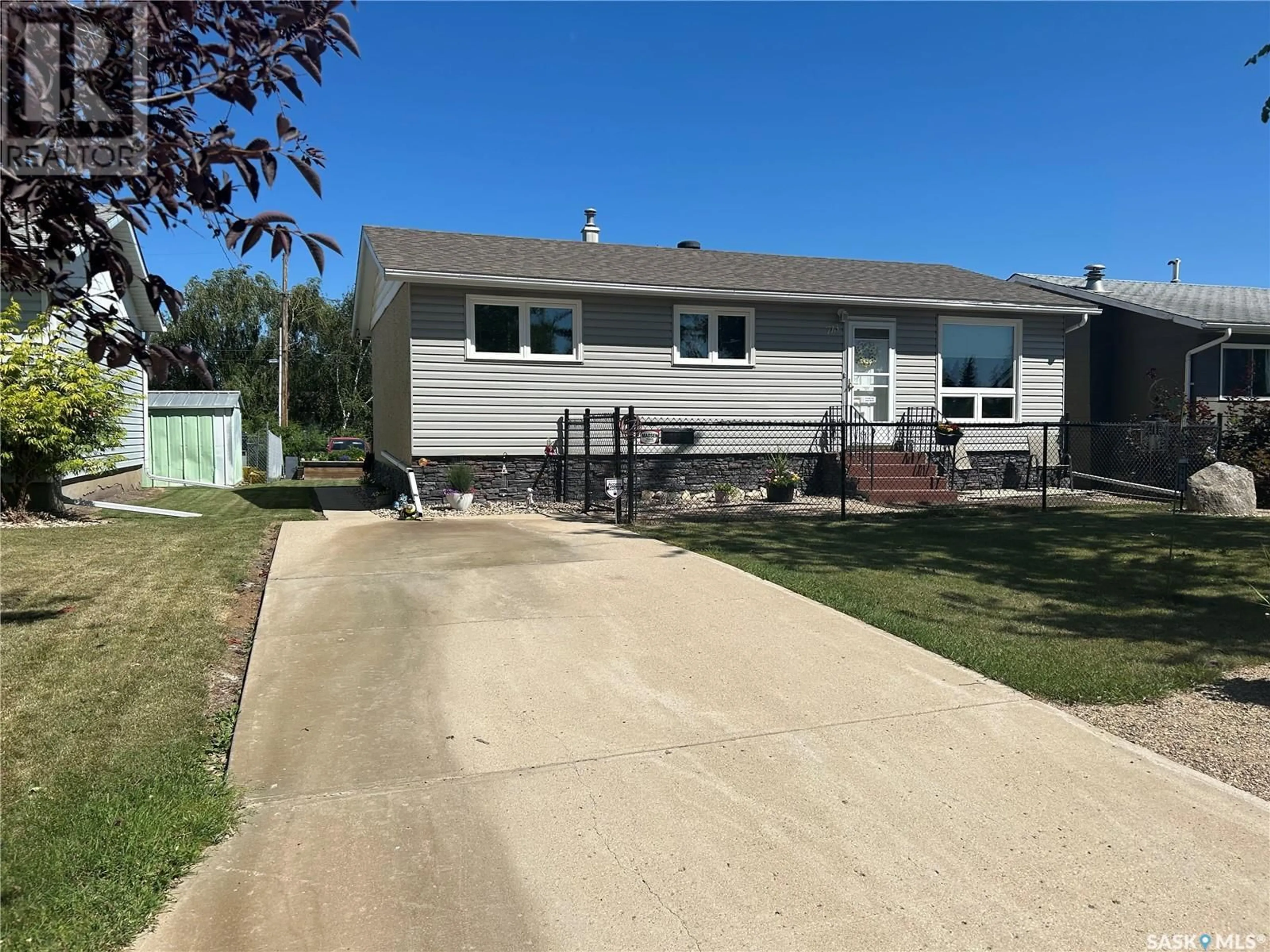 Frontside or backside of a home for 713 97th AVENUE, Tisdale Saskatchewan S0E1T0