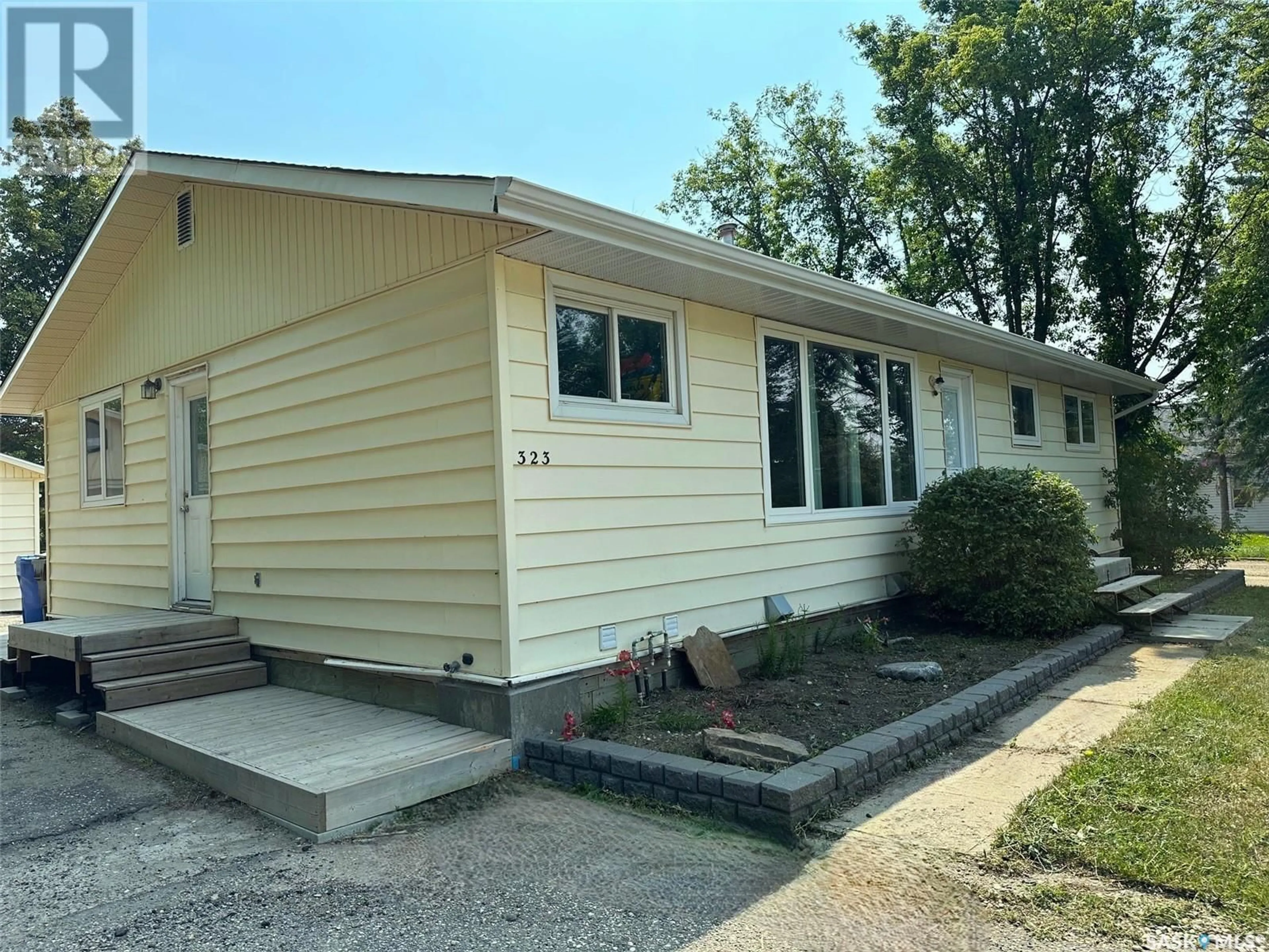 Home with vinyl exterior material for 323 Government ROAD, Stoughton Saskatchewan S0G4T0