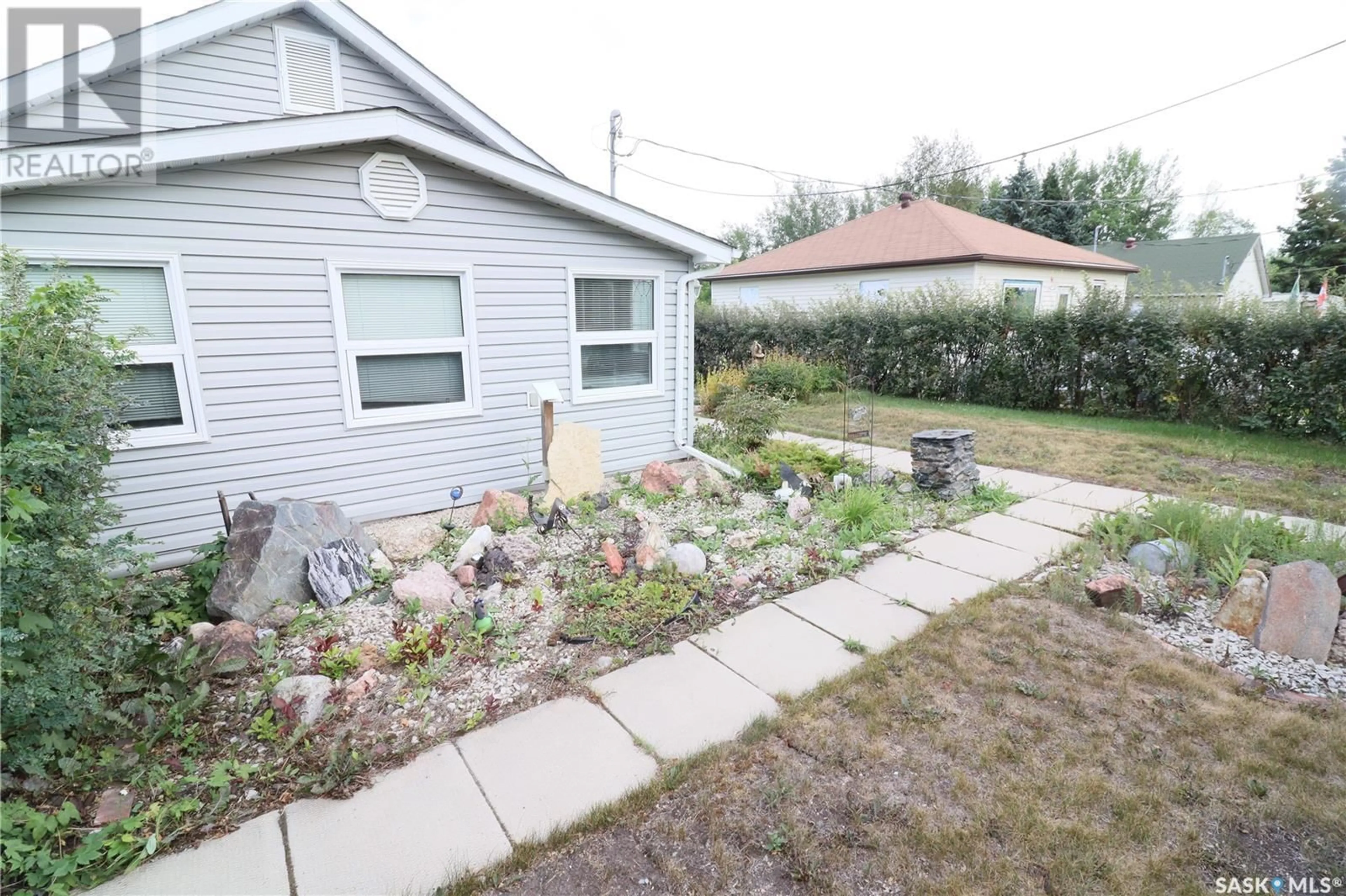 Patio, the fenced backyard for 308 1st STREET E, Creighton Saskatchewan S0P0A0