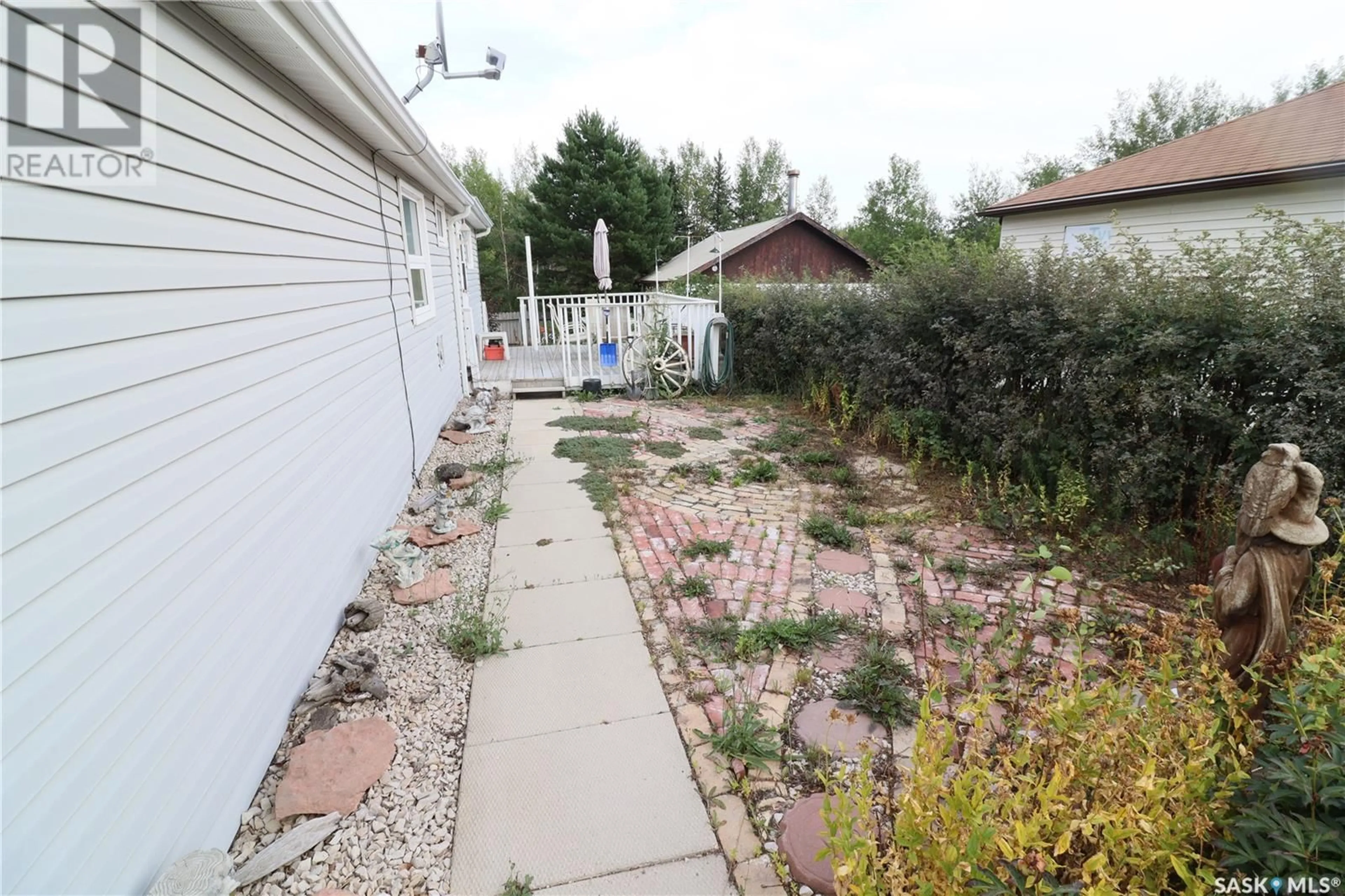 Patio, the fenced backyard for 308 1st STREET E, Creighton Saskatchewan S0P0A0