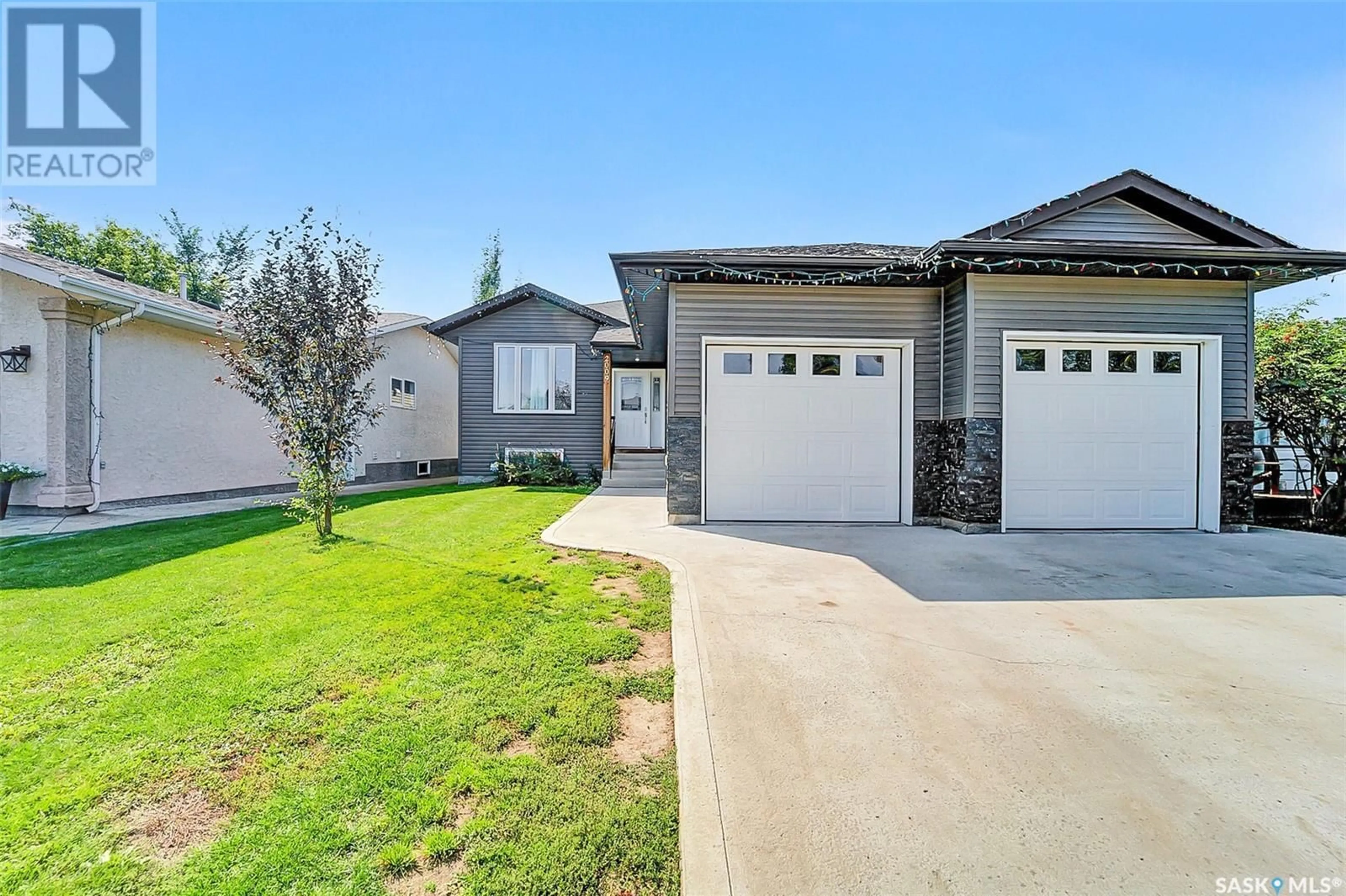 Frontside or backside of a home for 2009 9th STREET, Rosthern Saskatchewan S0K3R0