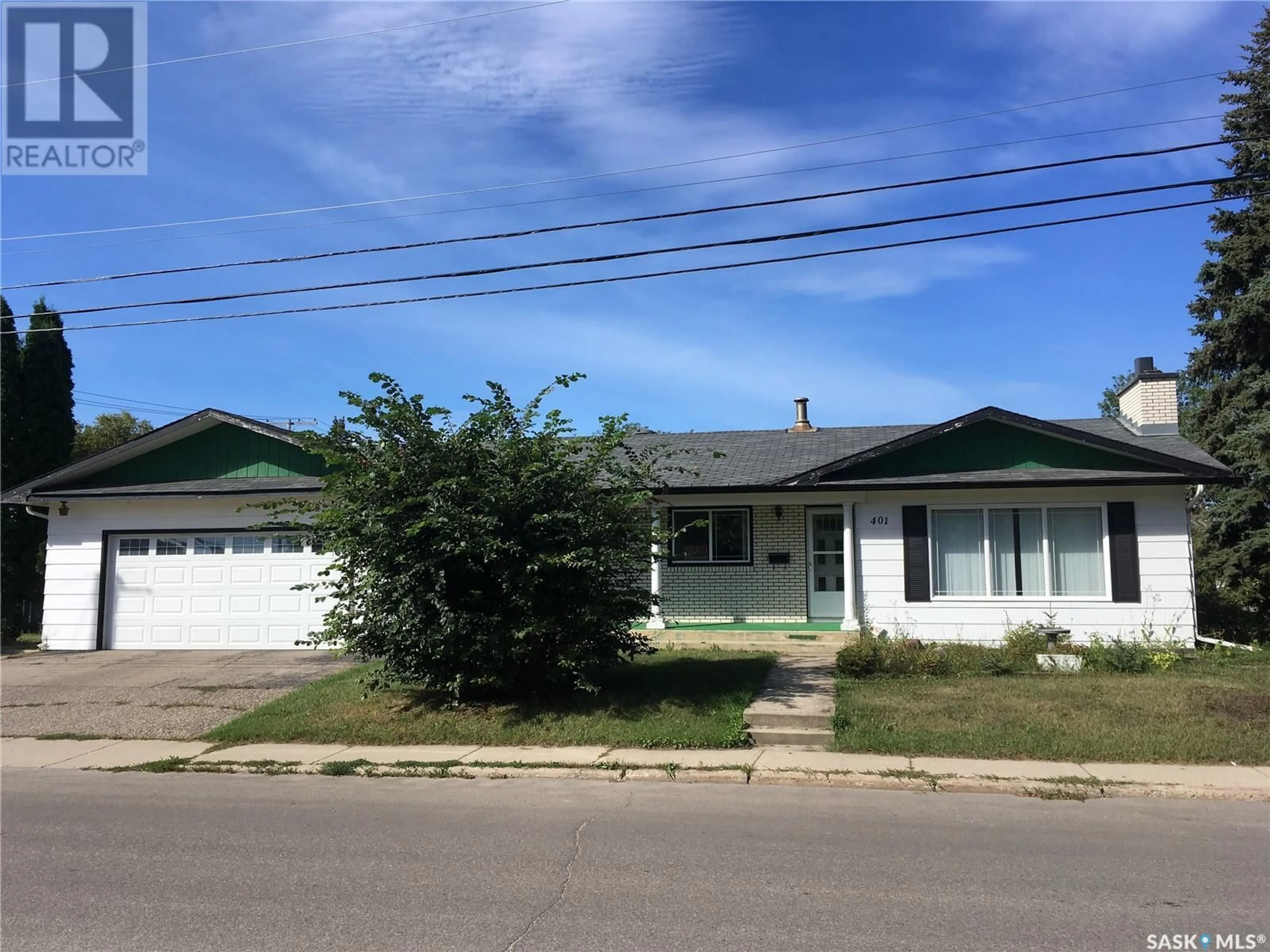 Frontside or backside of a home for 401 22nd STREET W, Prince Albert Saskatchewan S6V4K7