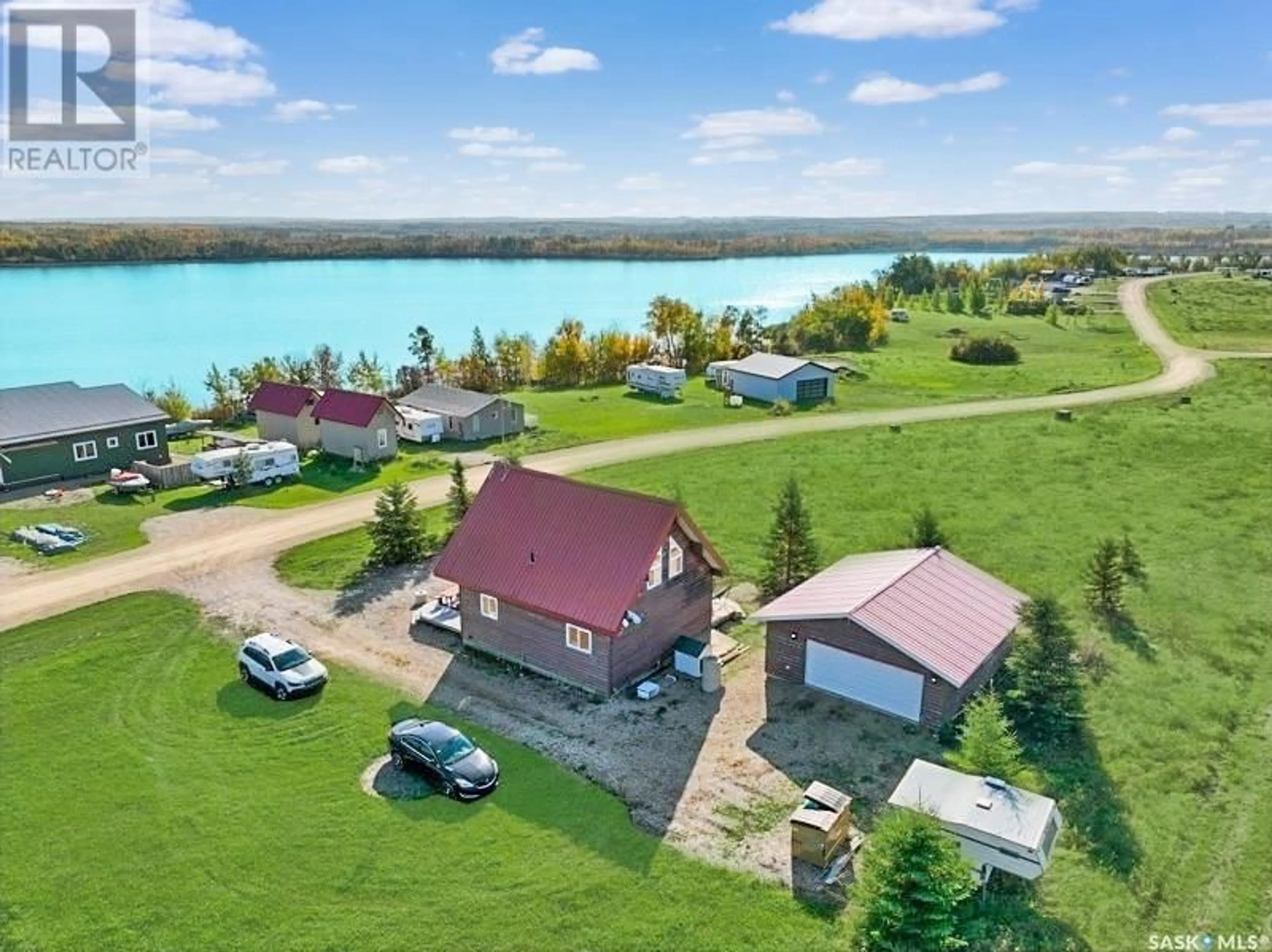 A pic from outside/outdoor area/front of a property/back of a property/a pic from drone, water/lake/river/ocean view for 9 BOUCHARD LANE, Dixon Lake Saskatchewan S0K1A0