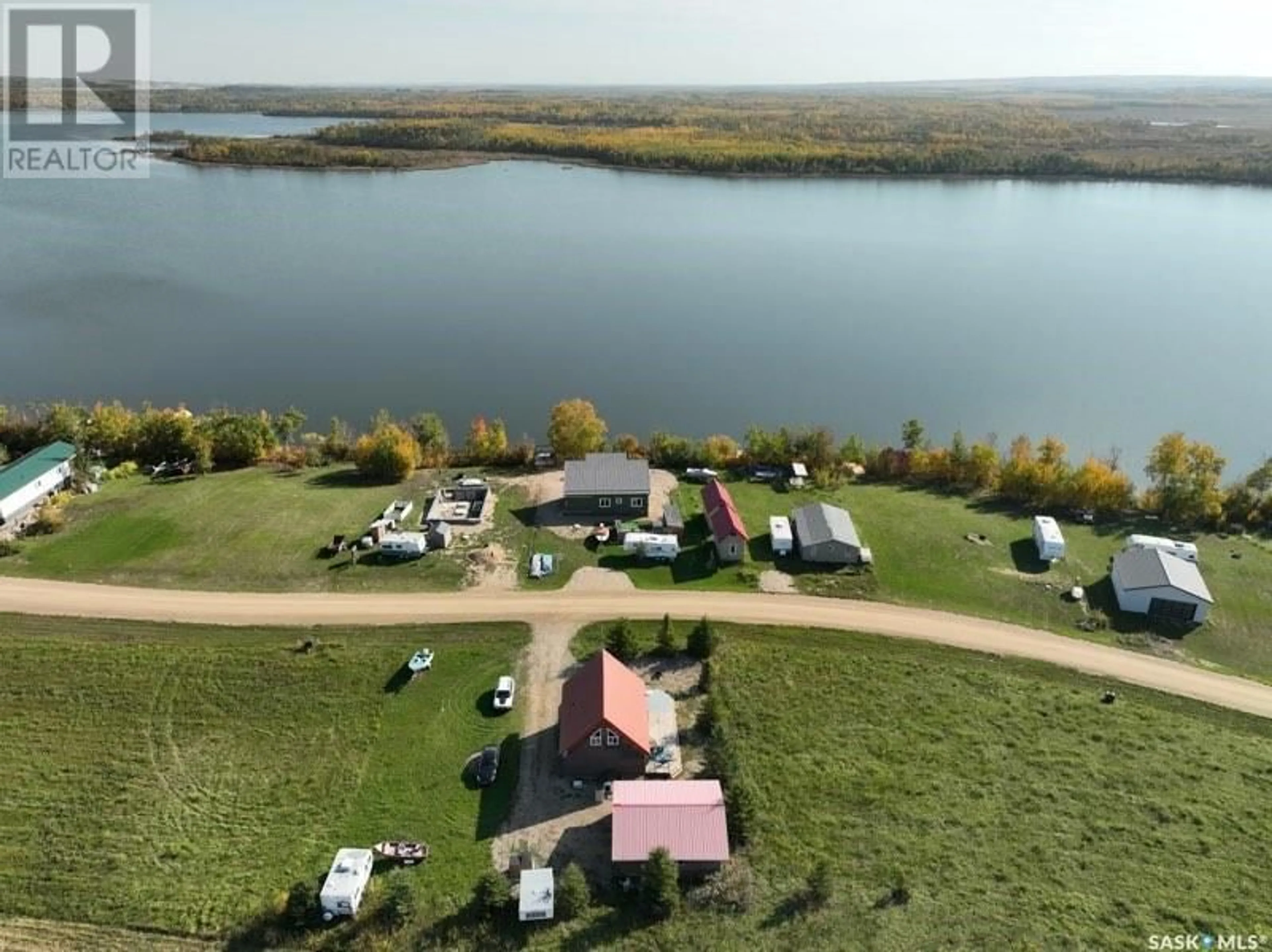 A pic from outside/outdoor area/front of a property/back of a property/a pic from drone, water/lake/river/ocean view for 9 Bouchard LANE, Dixon Lake Saskatchewan S0K1A0