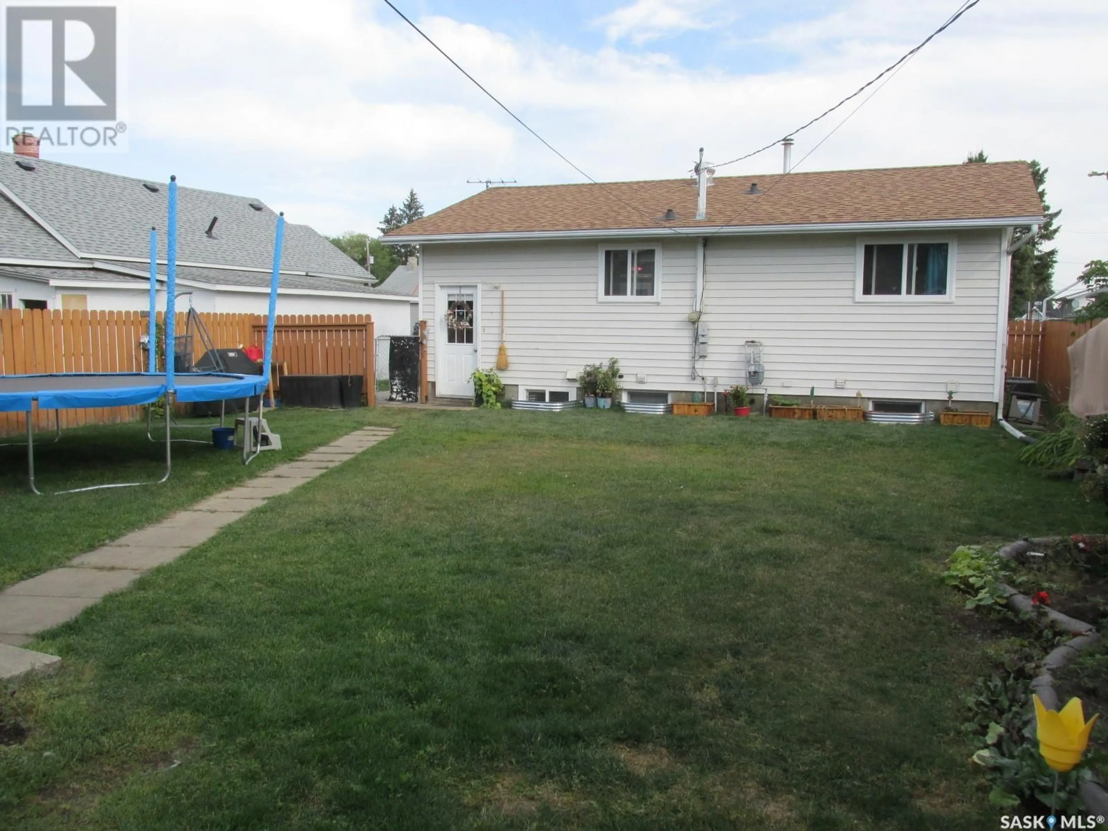 Fenced yard for 302 7th AVENUE W, Nipawin Saskatchewan S0E1E0