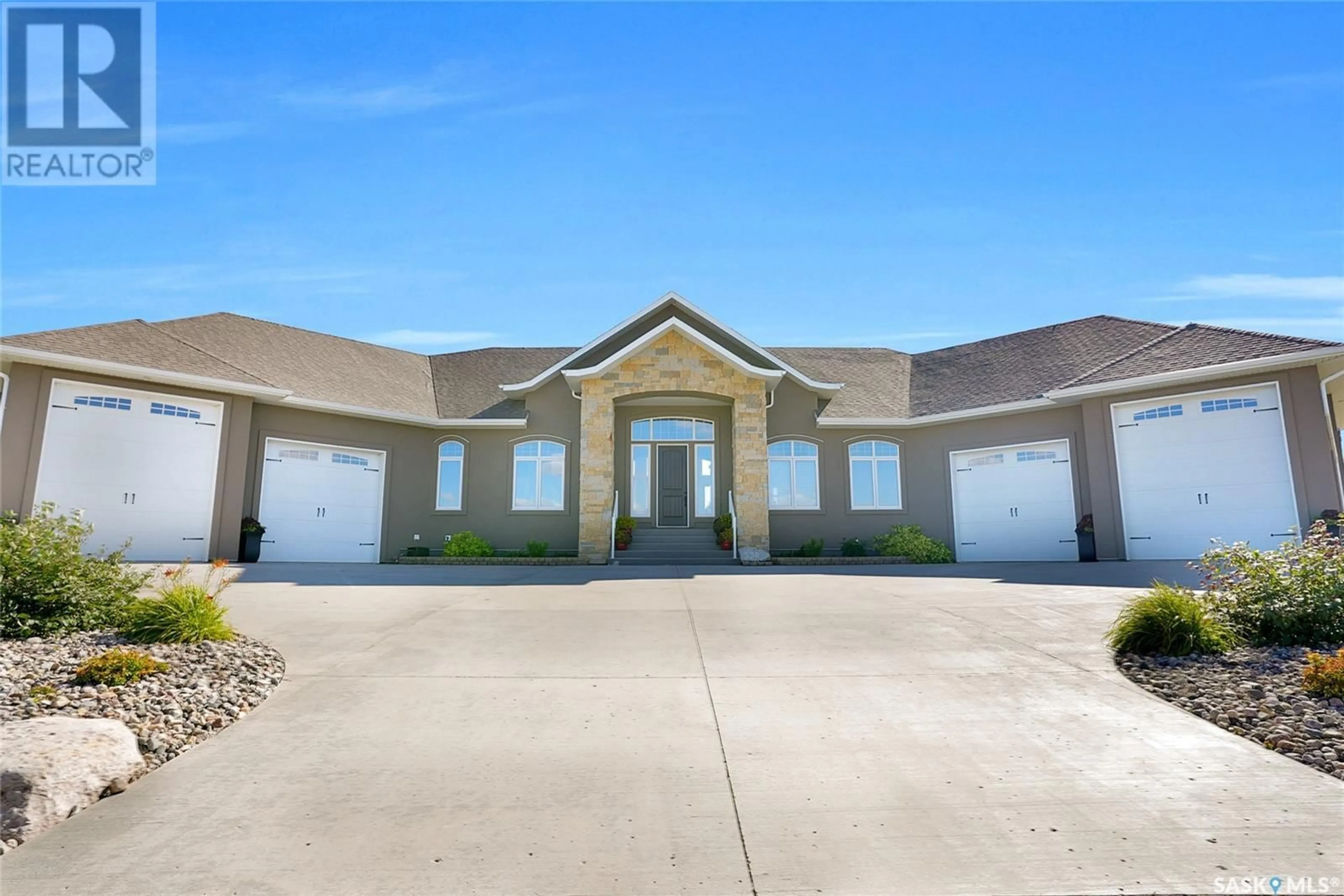 Frontside or backside of a home, the front or back of building for 330 Spruce Creek DRIVE, Edenwold Rm No. 158 Saskatchewan S0G3Z0