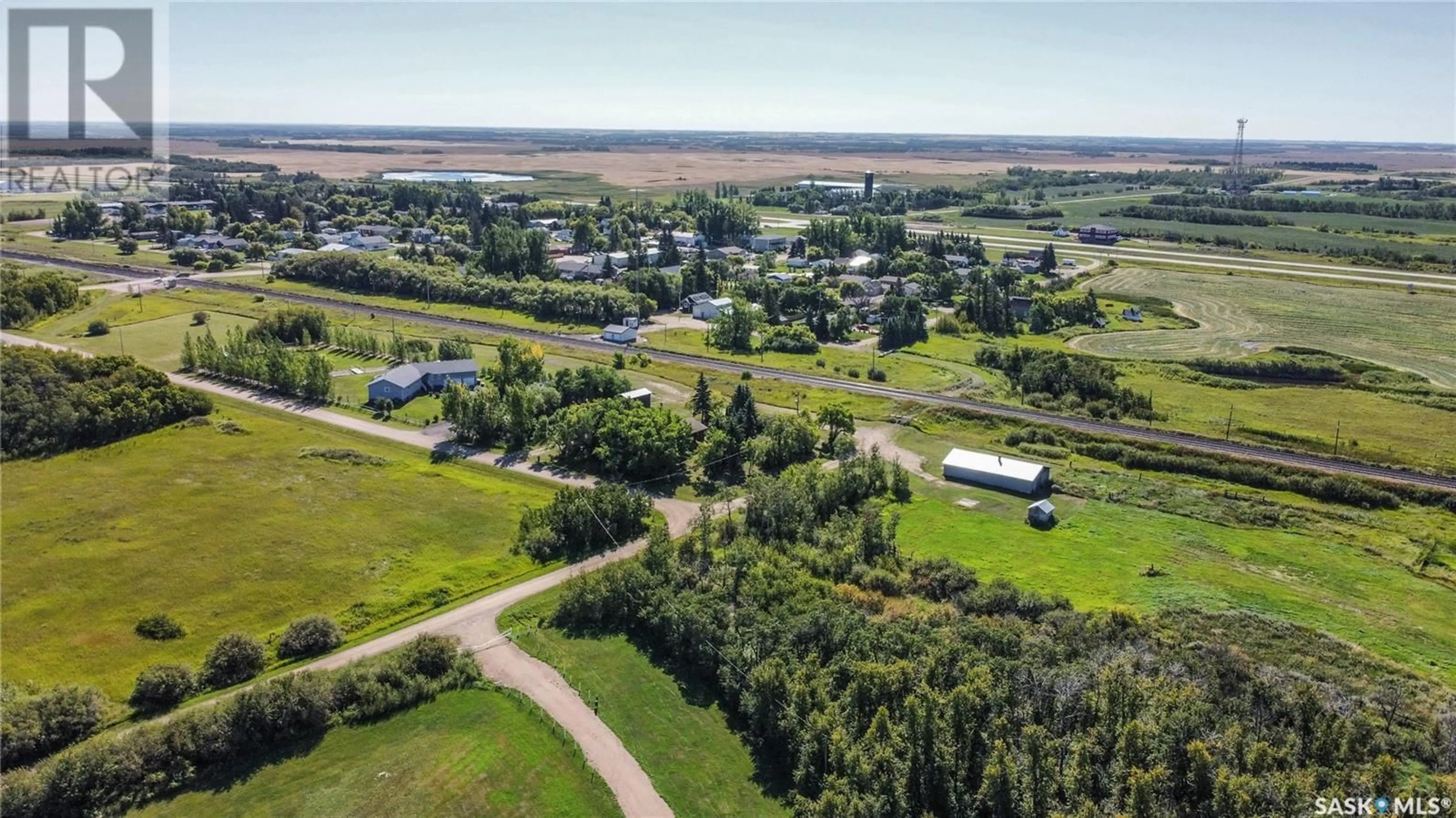 A pic from exterior of the house or condo, the fenced backyard for 100 Ebenal WAY, Mclean Saskatchewan S0G3E0