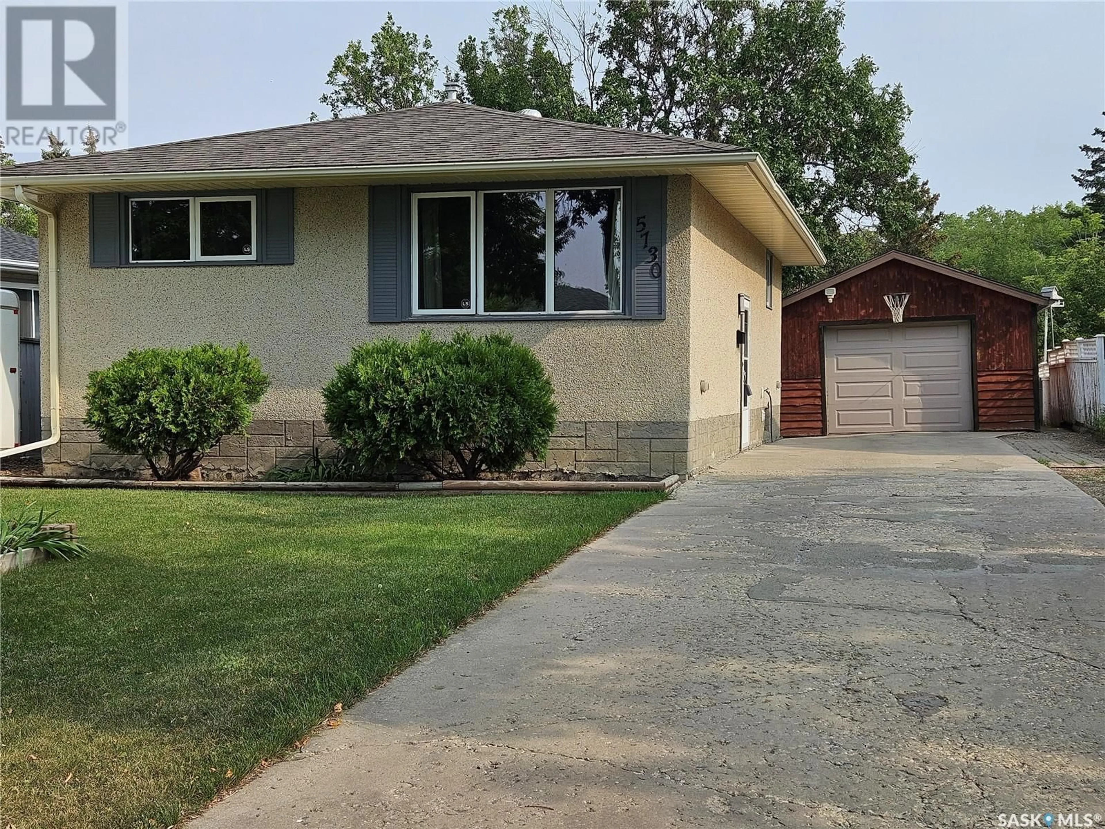 Frontside or backside of a home for 5730 2nd AVENUE N, Regina Saskatchewan S4R5M5