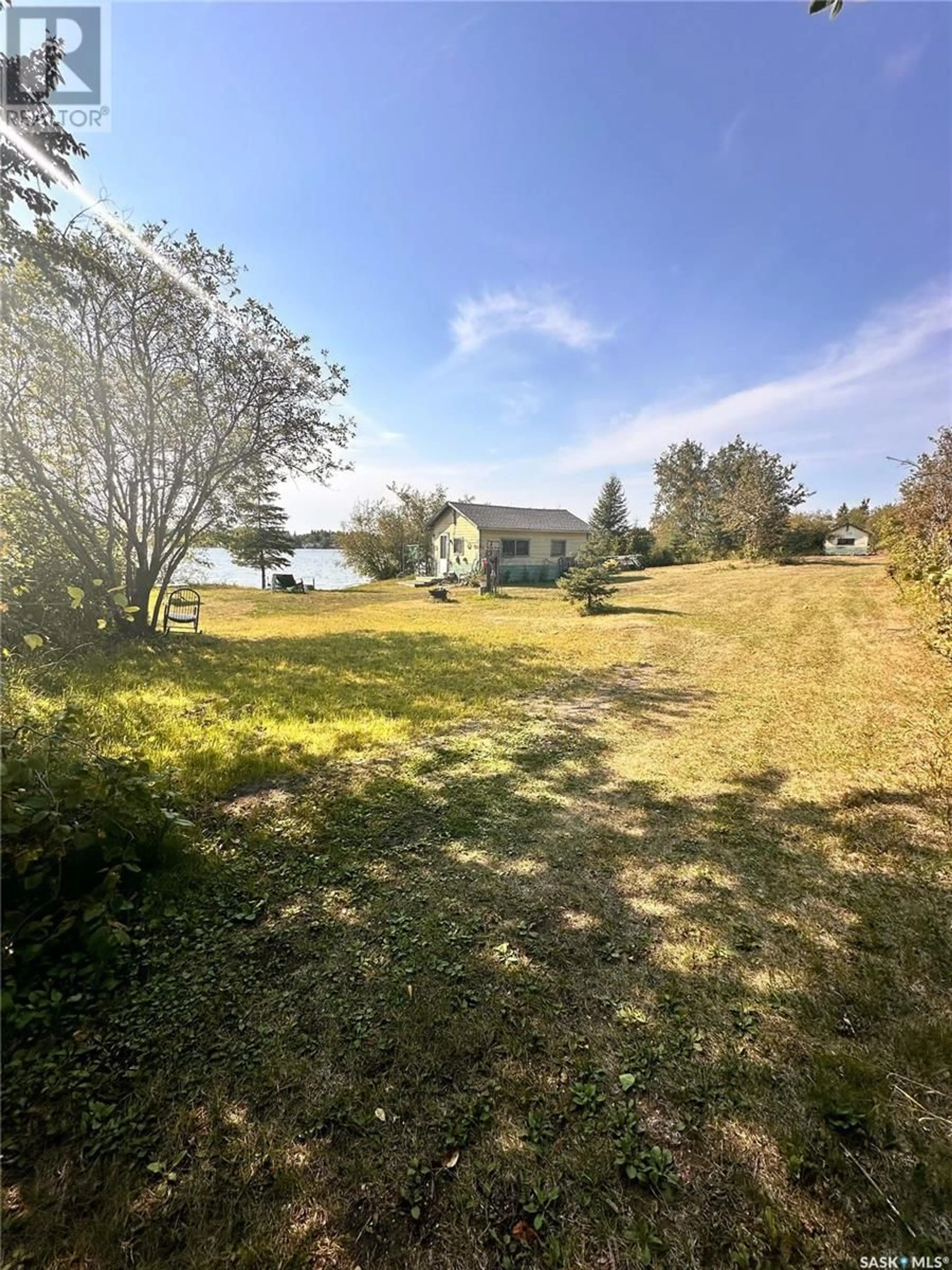 A pic from outside/outdoor area/front of a property/back of a property/a pic from drone, water/lake/river/ocean view for 323 Lakeview DRIVE, Crystal Lake Saskatchewan S0A3X0