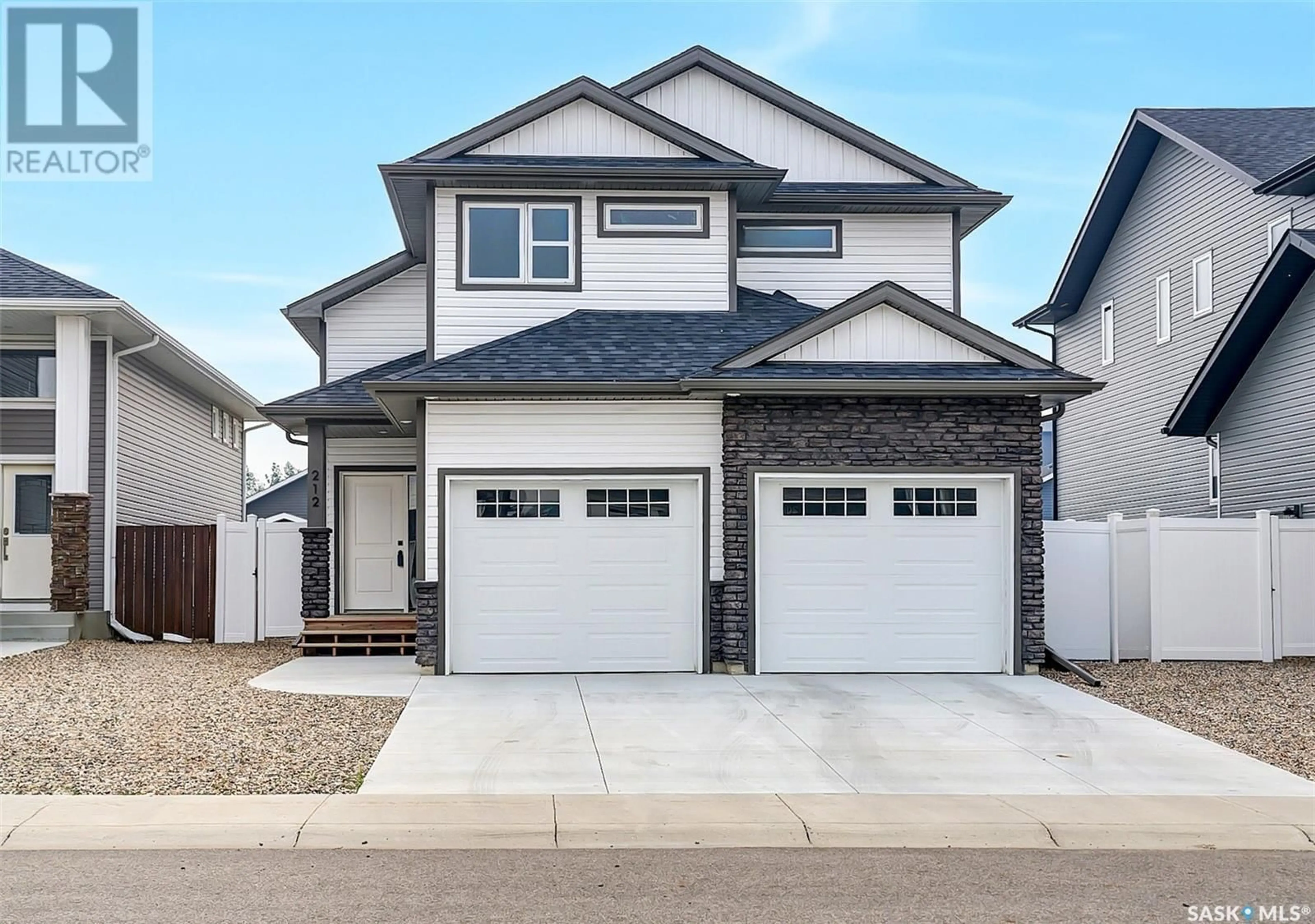 Frontside or backside of a home for 212 Cowan CRESCENT, Martensville Saskatchewan S0K2T1