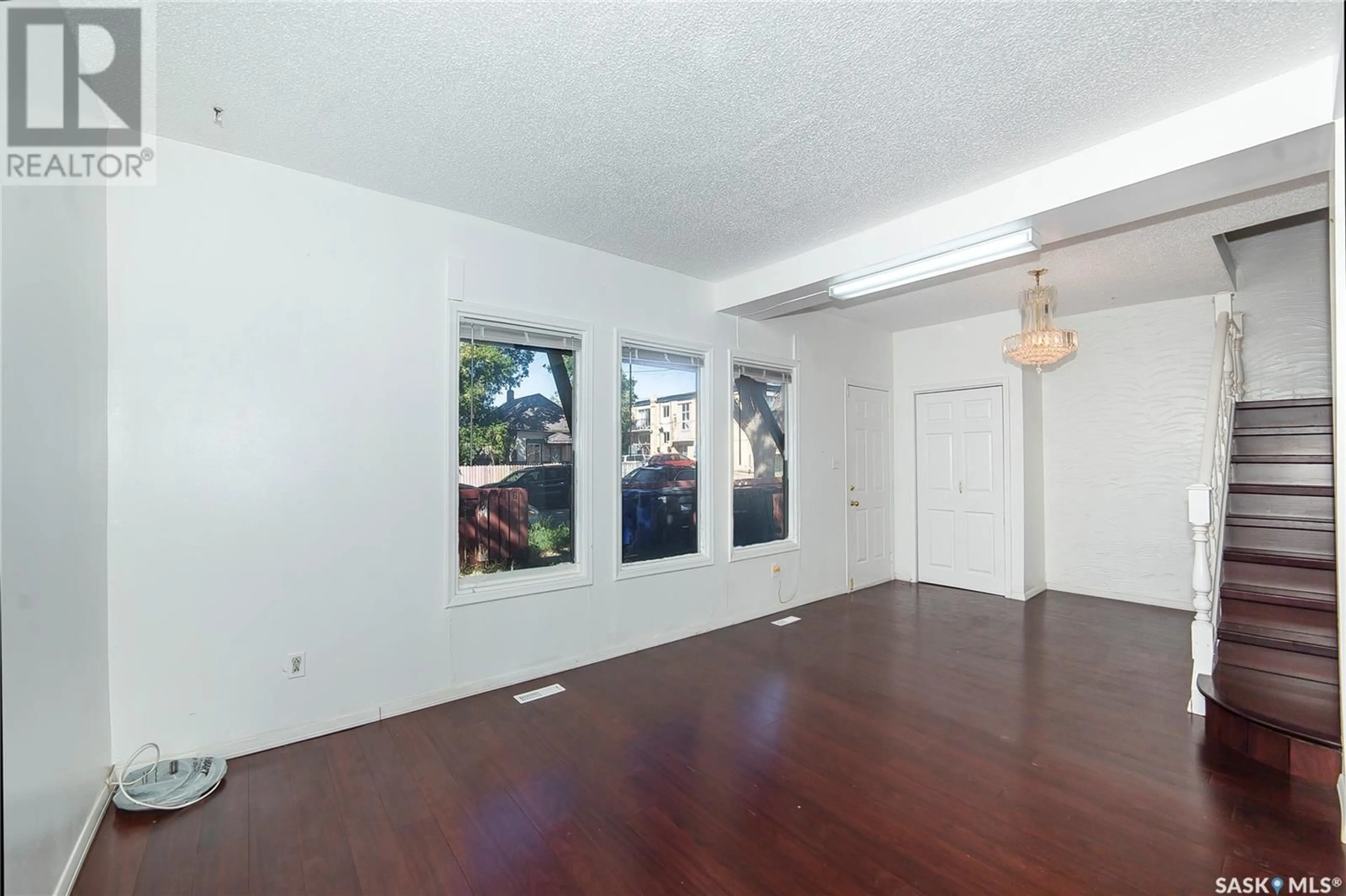 A pic of a room, wood floors for 116 S AVENUE S, Saskatoon Saskatchewan S7M2Z6