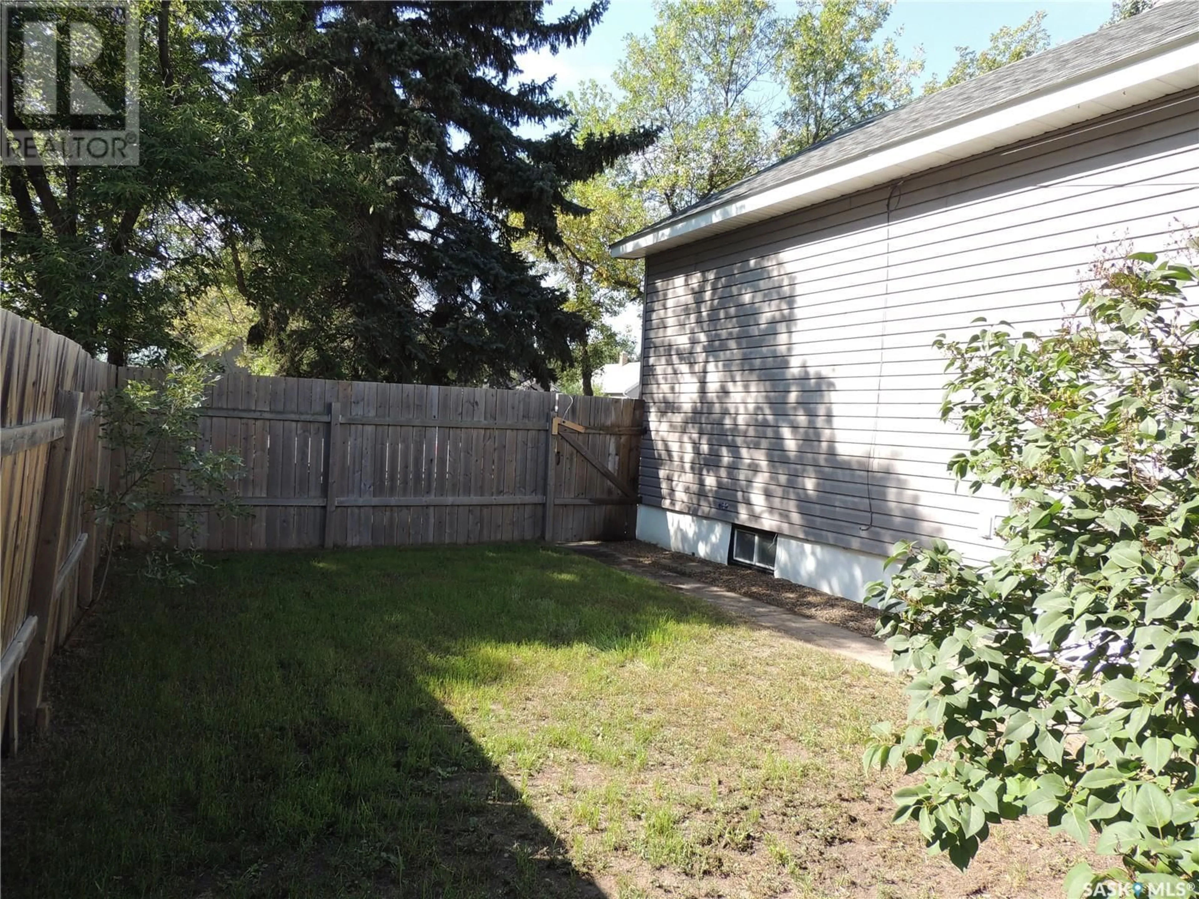 Fenced yard for 1421 4th STREET, Estevan Saskatchewan S4A0X3