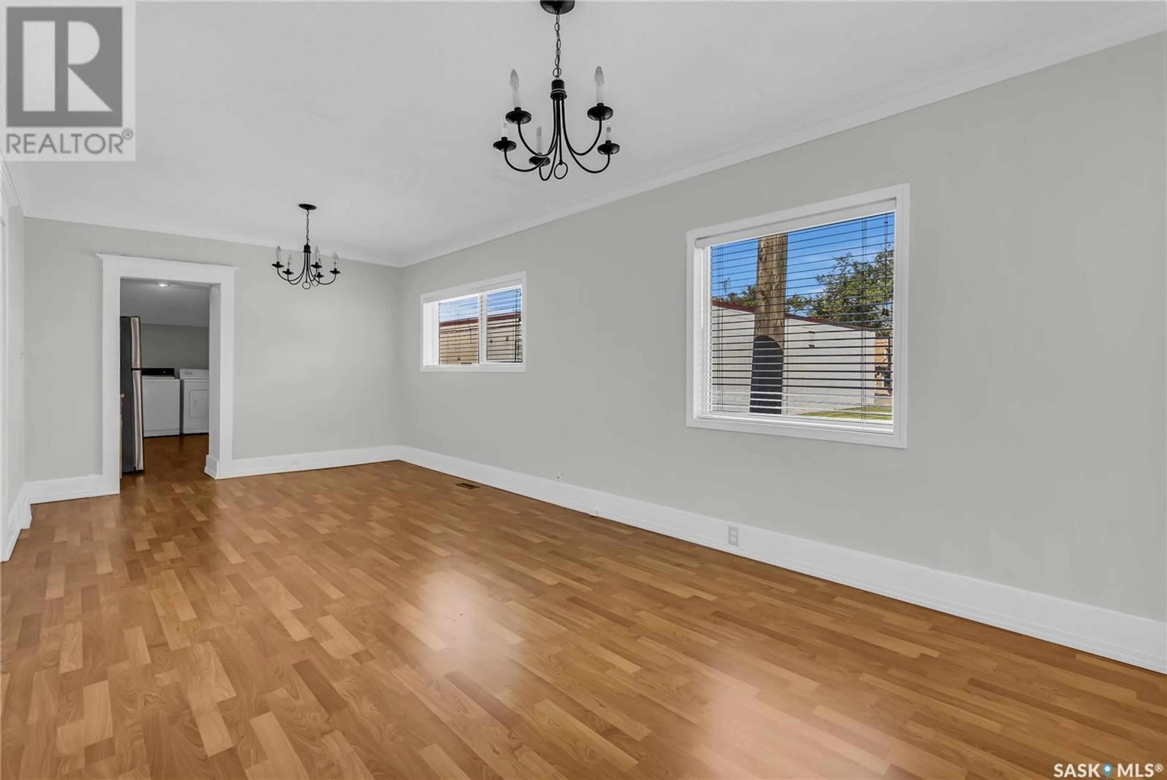 A pic of a room, wood floors for 1131 E AVENUE N, Saskatoon Saskatchewan S7L1T2