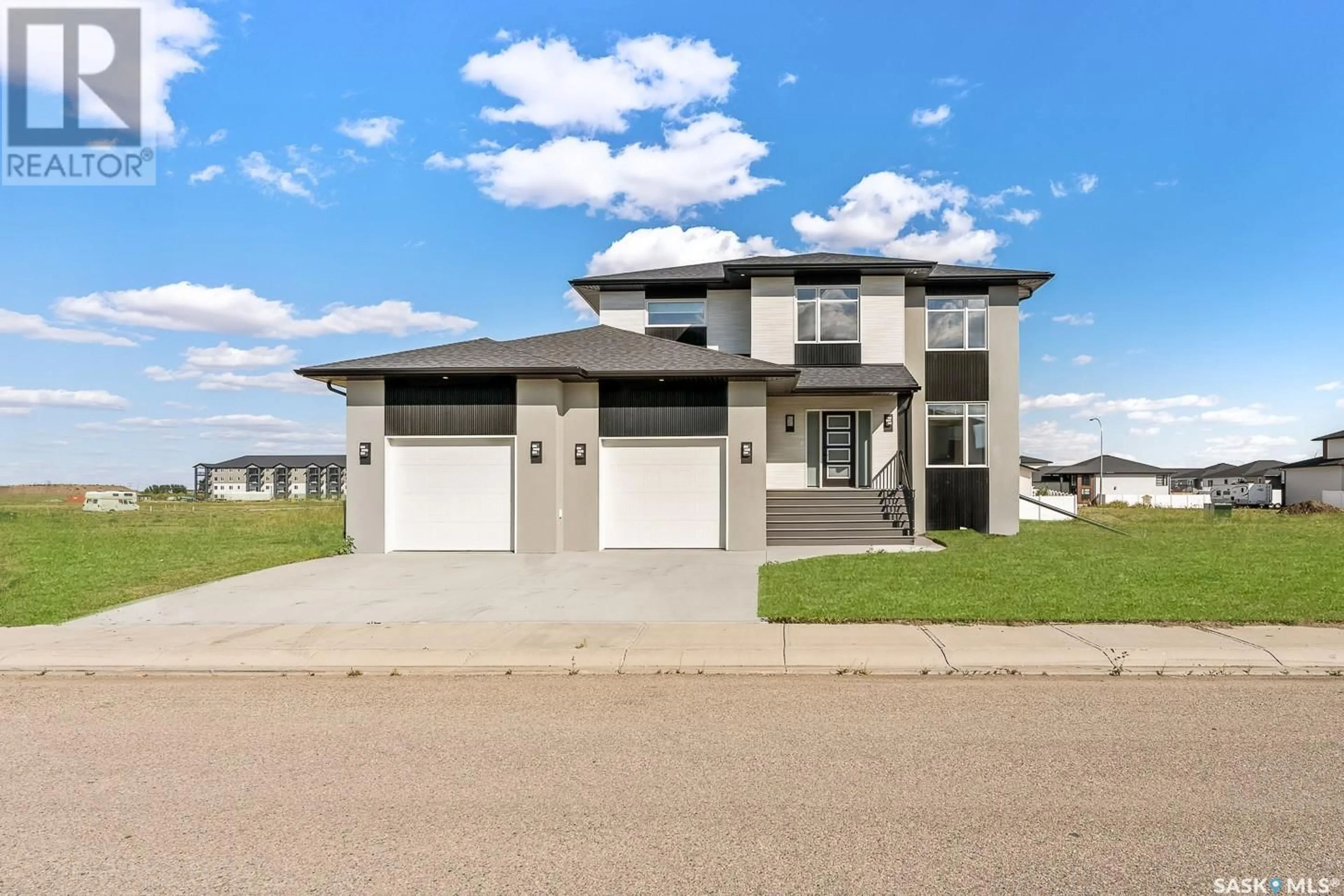 Frontside or backside of a home, the street view for 1737 Hayes LANE, Moose Jaw Saskatchewan S6J0B6