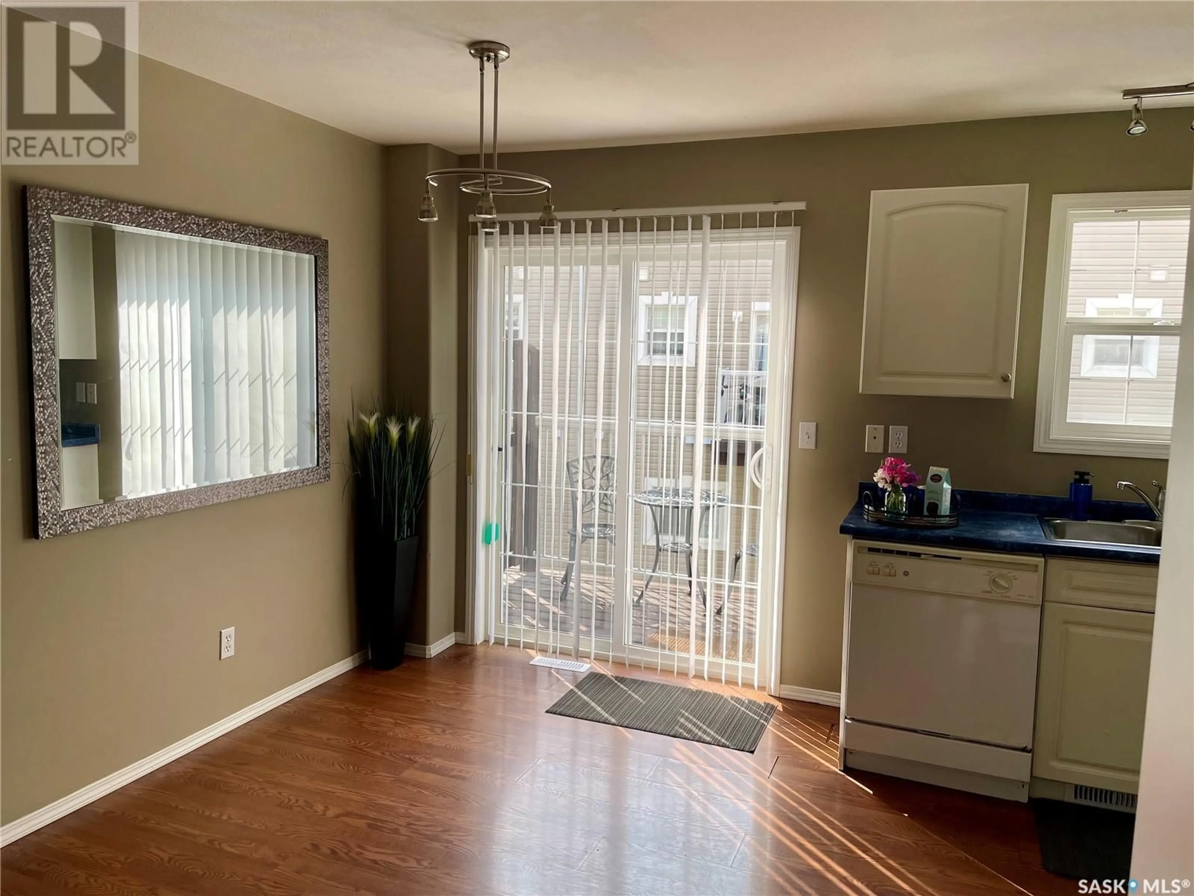 A pic of a room, wood floors for 27 302 Herold ROAD, Saskatoon Saskatchewan S7V1J3