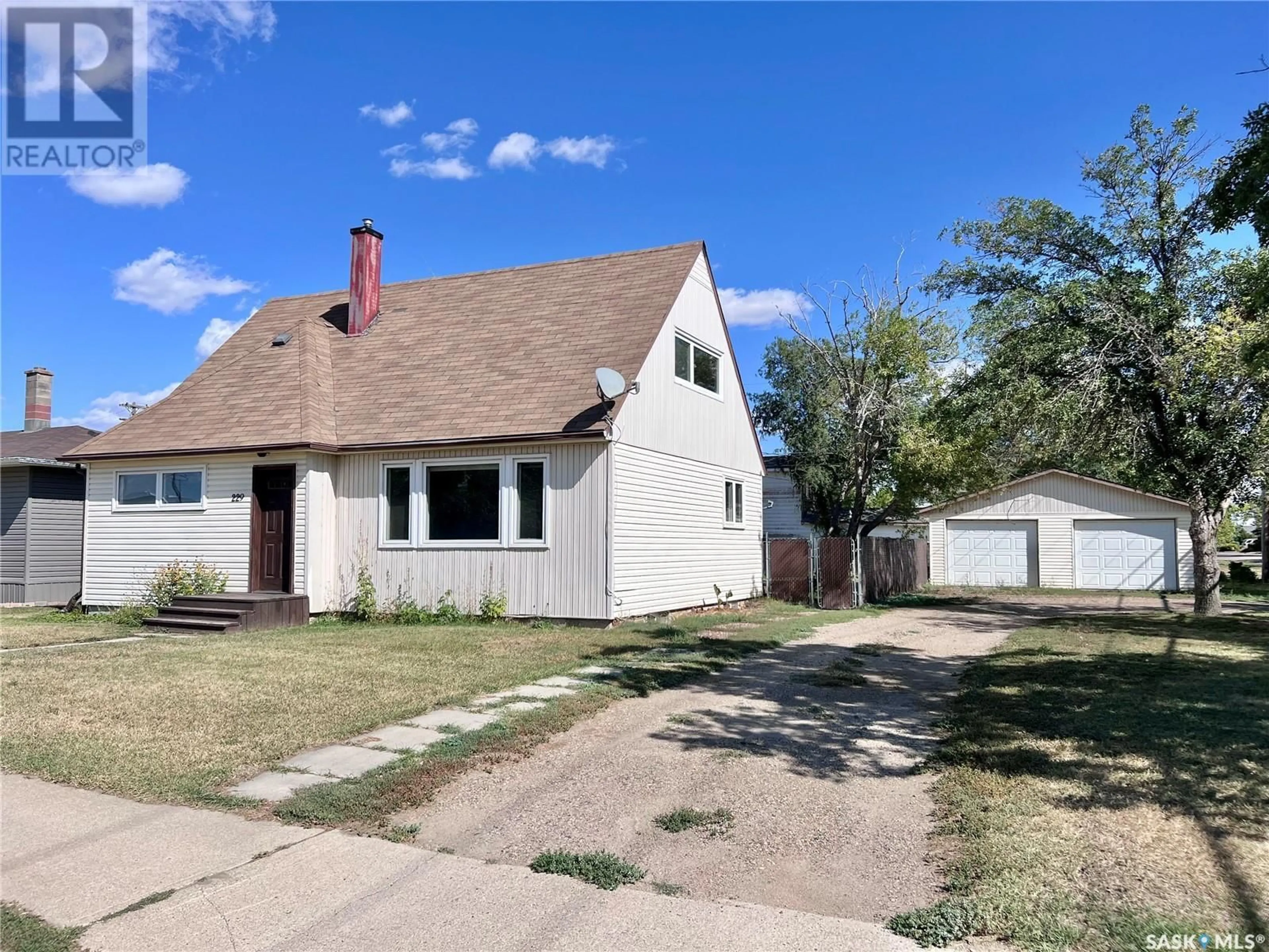 Frontside or backside of a home for 229 McTavish STREET, Outlook Saskatchewan S0L2N0