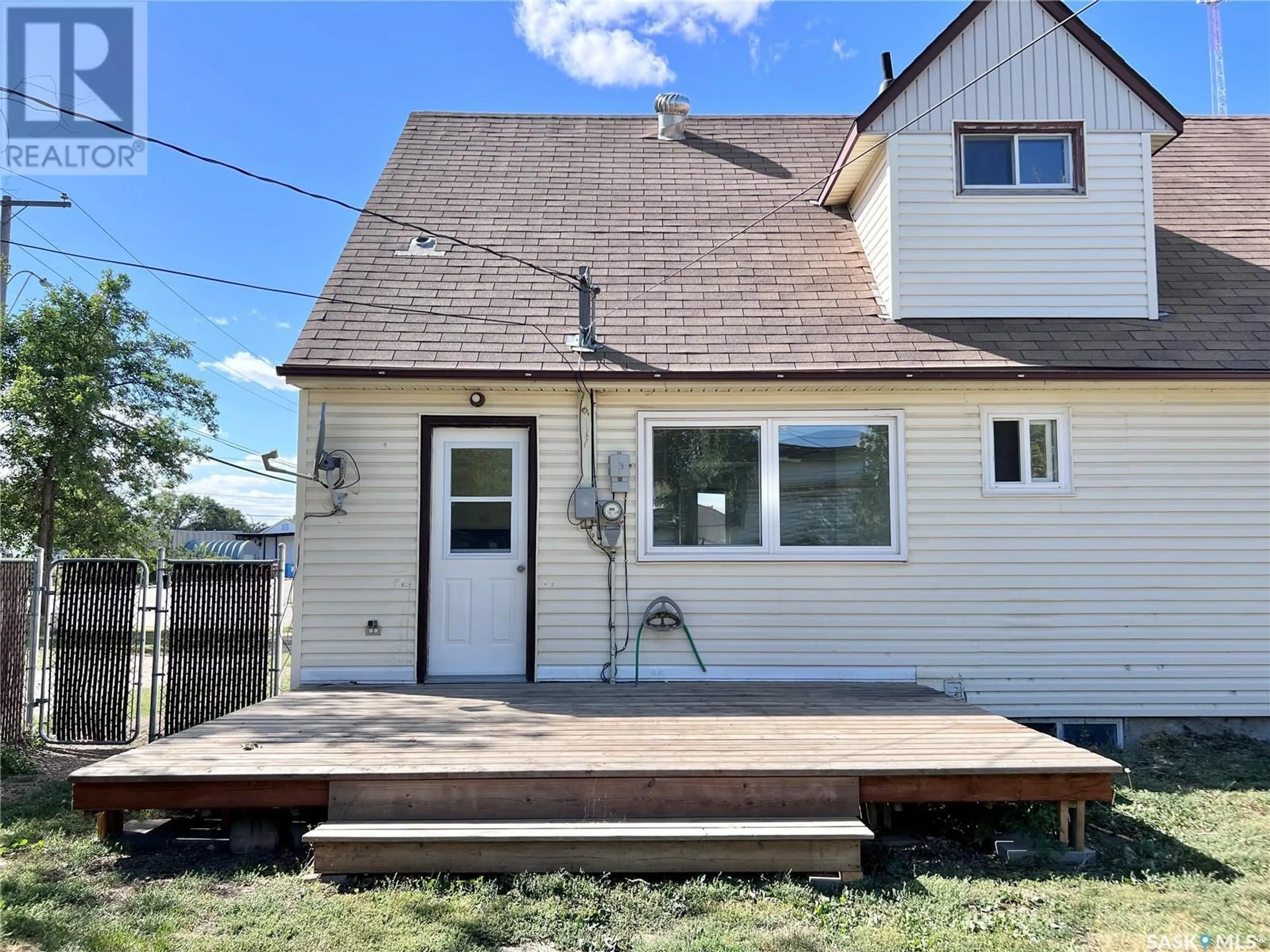 Frontside or backside of a home, cottage for 229 McTavish STREET, Outlook Saskatchewan S0L2N0