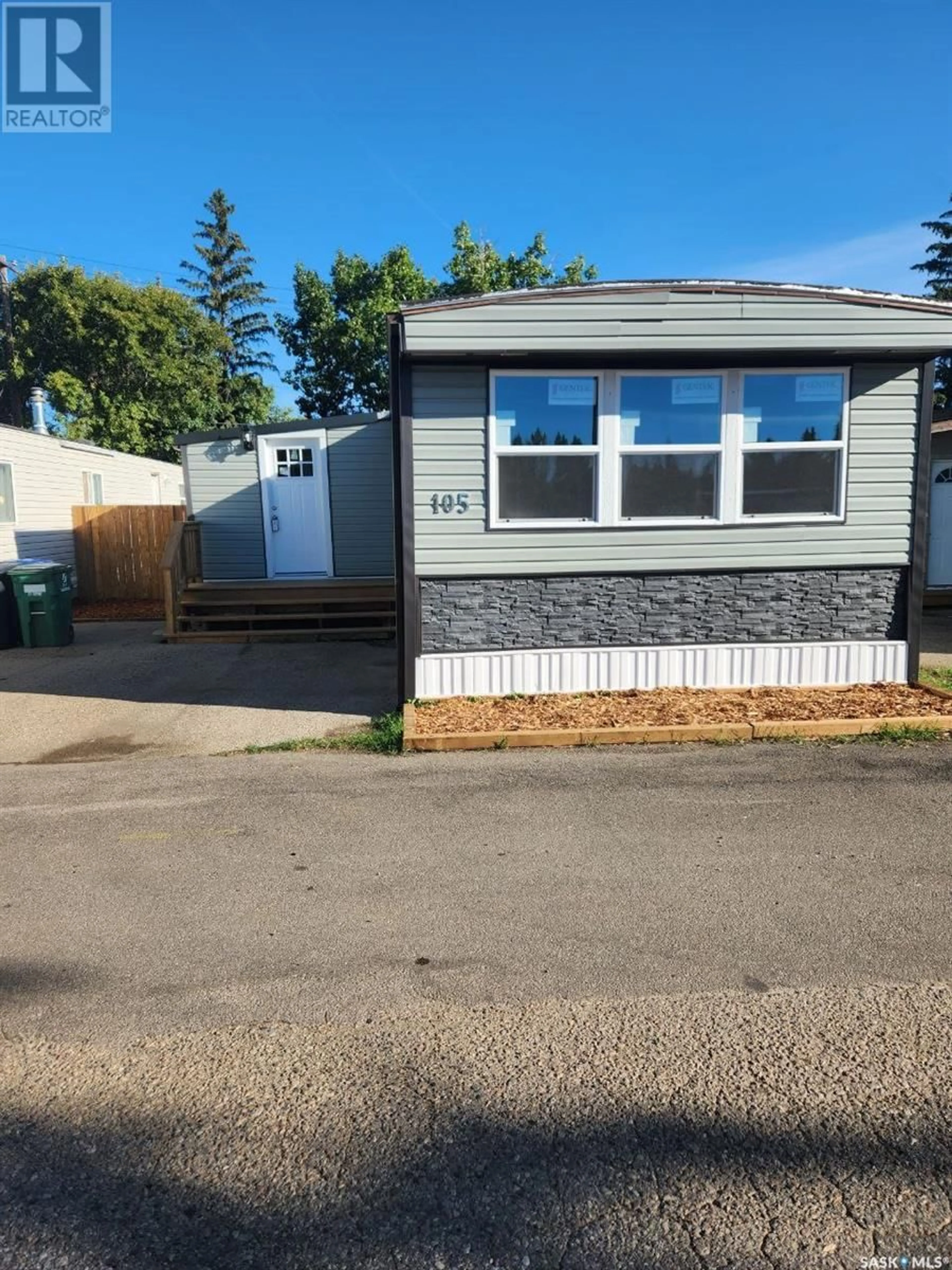 Home with vinyl exterior material for 105 219 Grant STREET, Saskatoon Saskatchewan S7N2A5