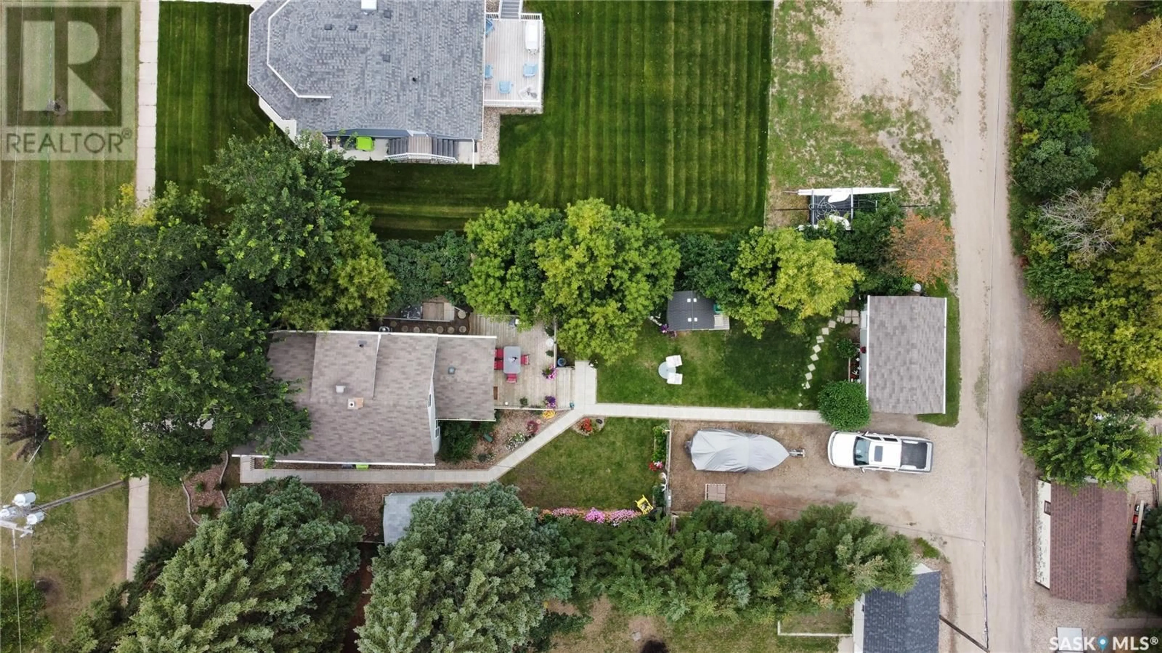 Frontside or backside of a home, the fenced backyard for 903 Grand AVENUE, Indian Head Saskatchewan S0G2K0