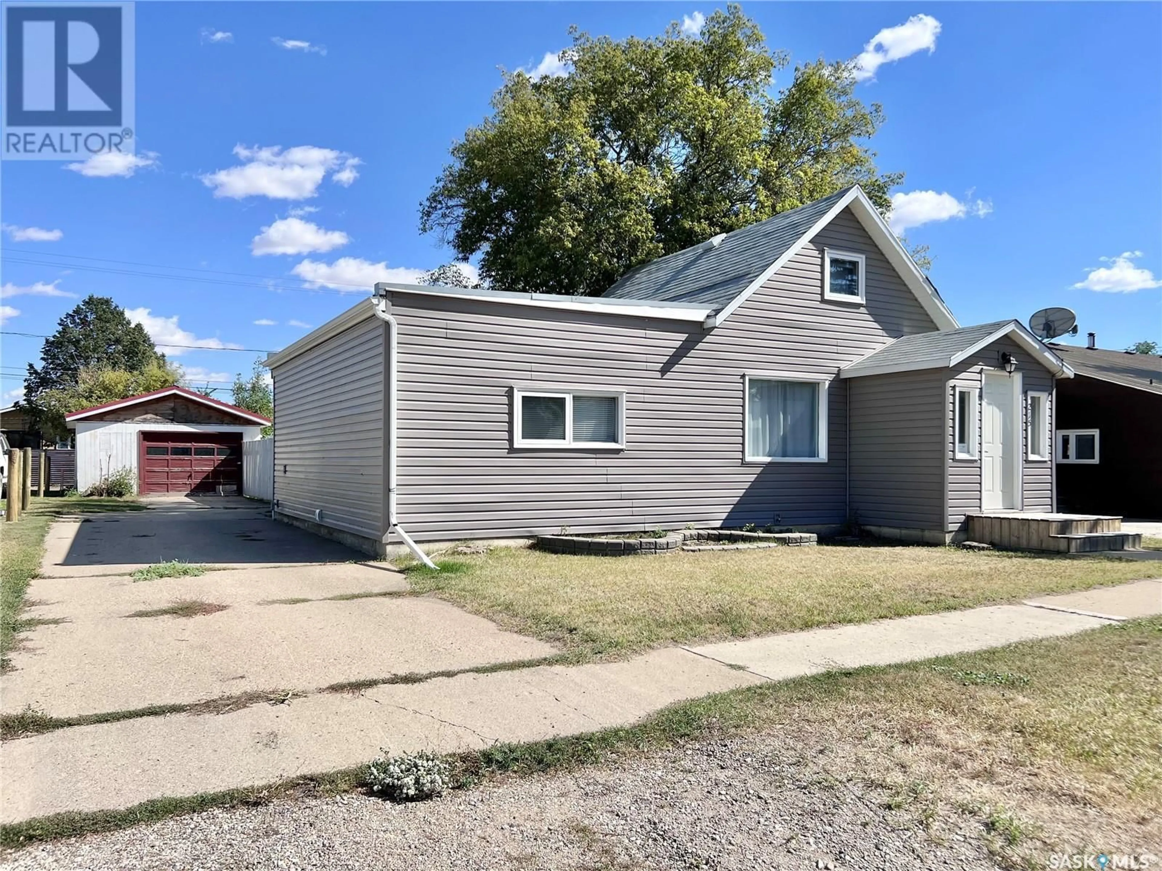 Frontside or backside of a home, the street view for 215 Simpson STREET, Outlook Saskatchewan S0L2N0