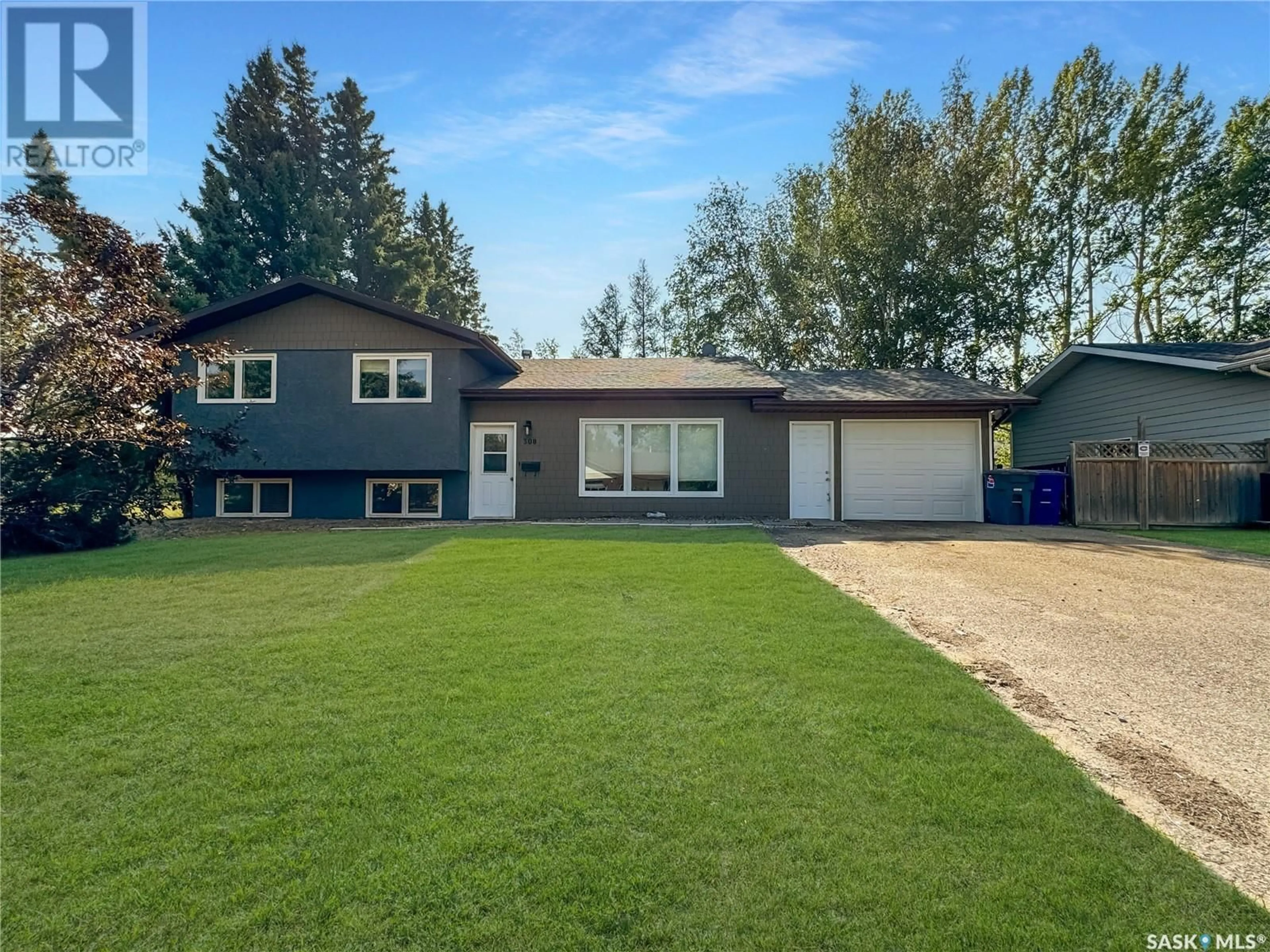 Home with vinyl exterior material, street for 308 FINLEY AVENUE, Cut Knife Saskatchewan S0M0N0