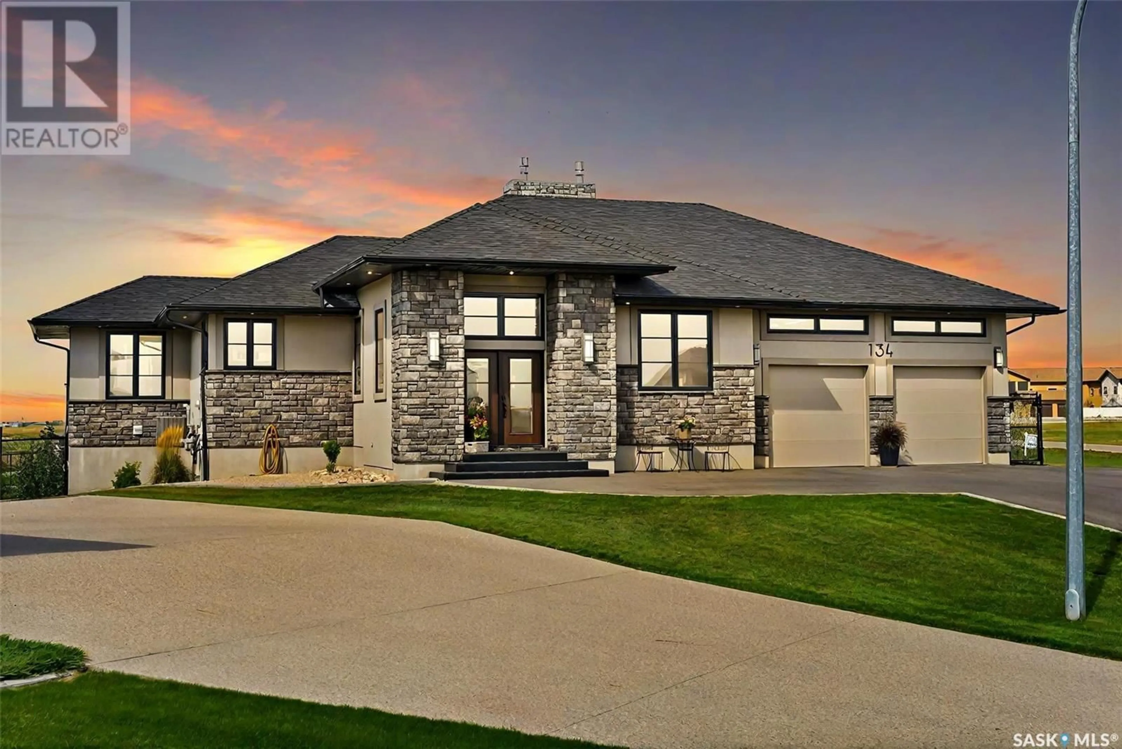 Frontside or backside of a home for 134 Aspen Village DRIVE, Emerald Park Saskatchewan S4L0C4