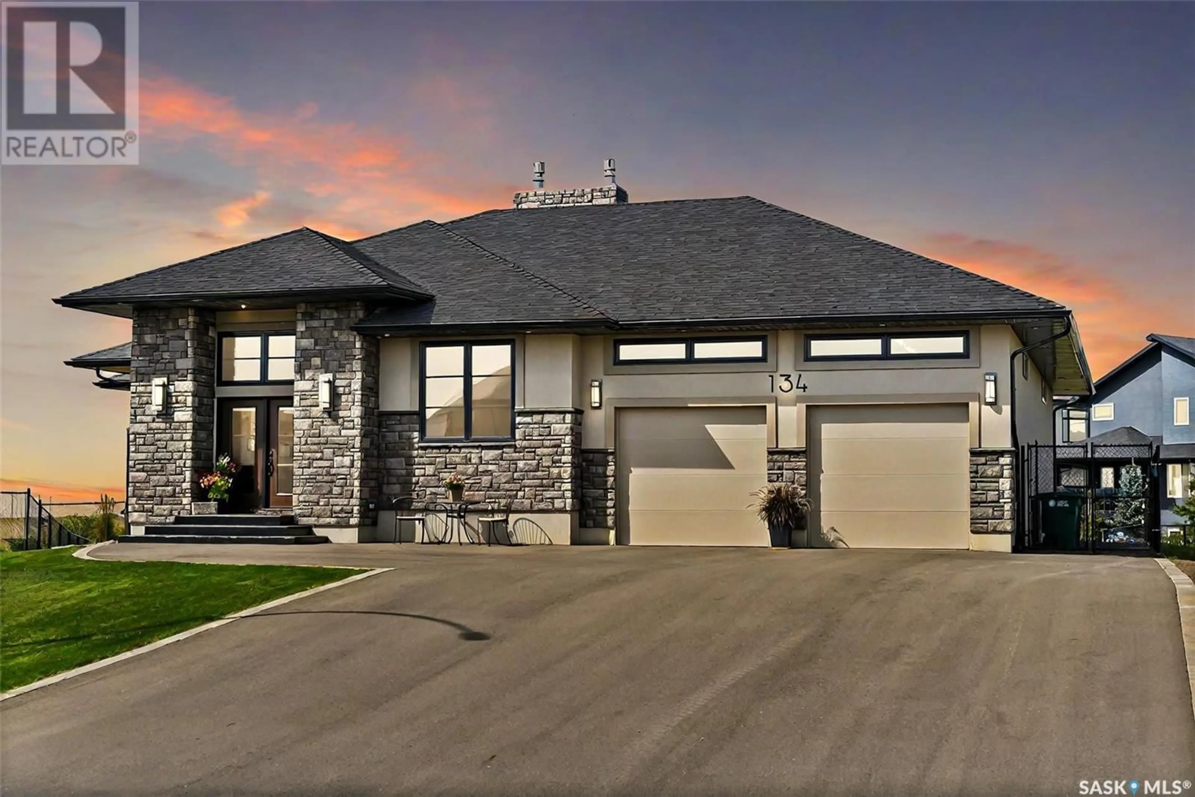 Frontside or backside of a home for 134 Aspen Village DRIVE, Emerald Park Saskatchewan S4L0C4