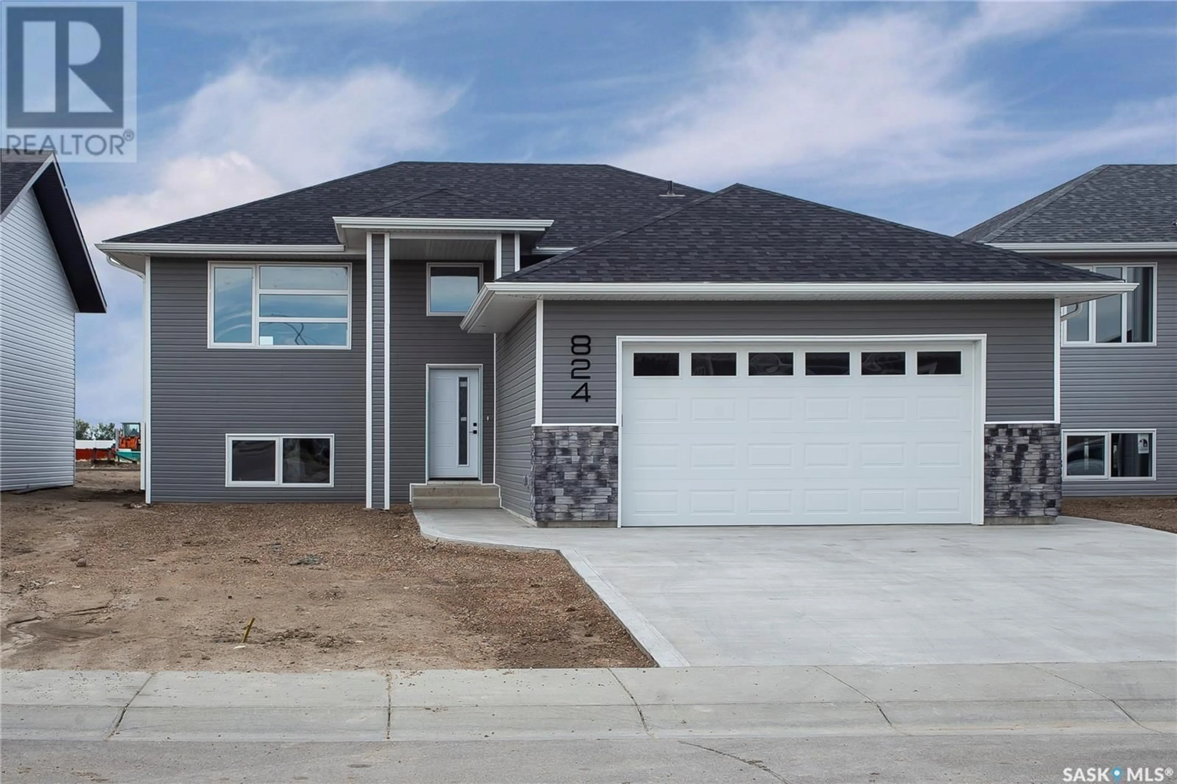 Frontside or backside of a home for 824 Weir CRESCENT, Warman Saskatchewan S0K4S4