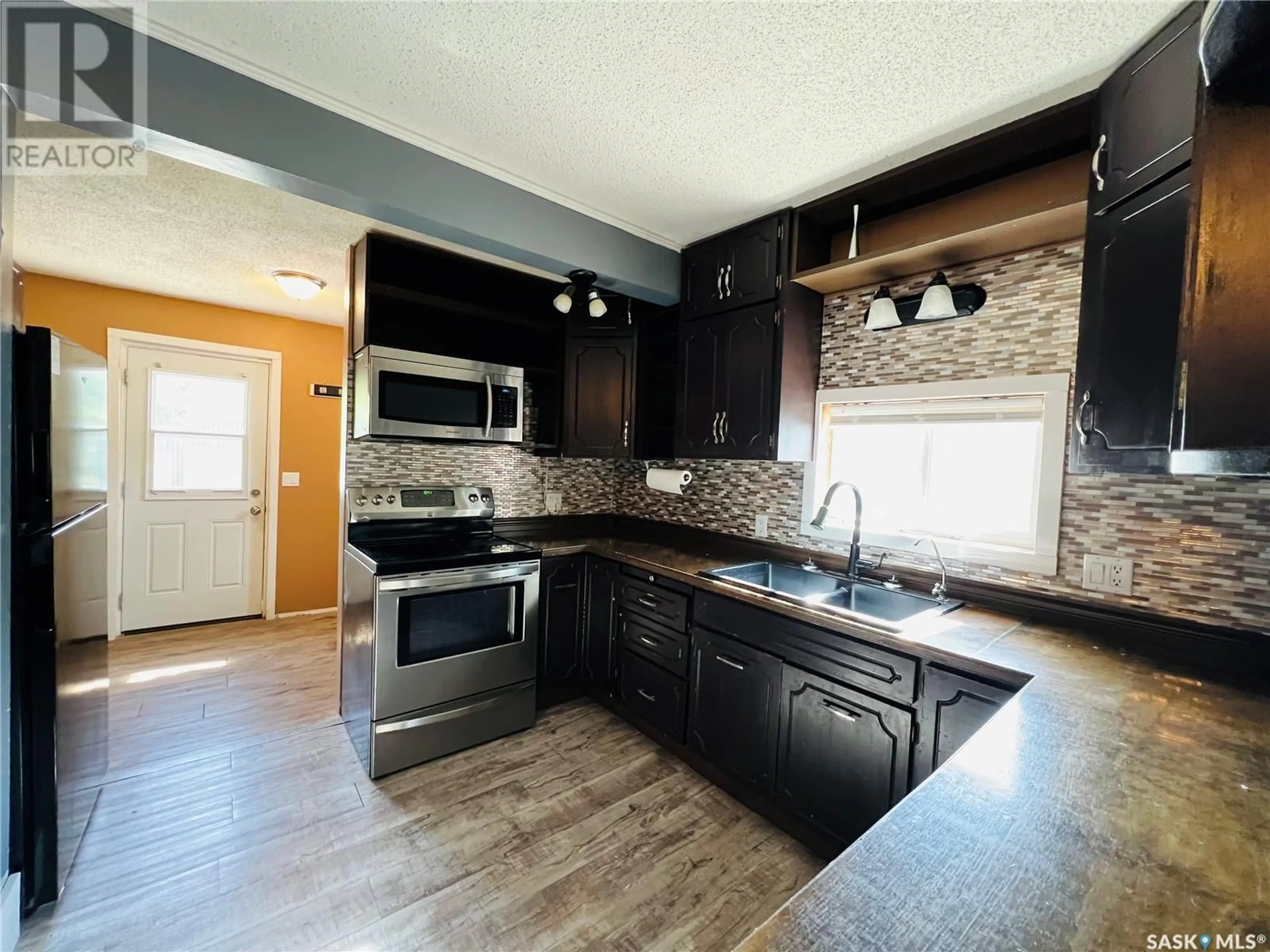 Open concept kitchen for 82 3rd AVENUE E, Central Butte Saskatchewan S0H0T0