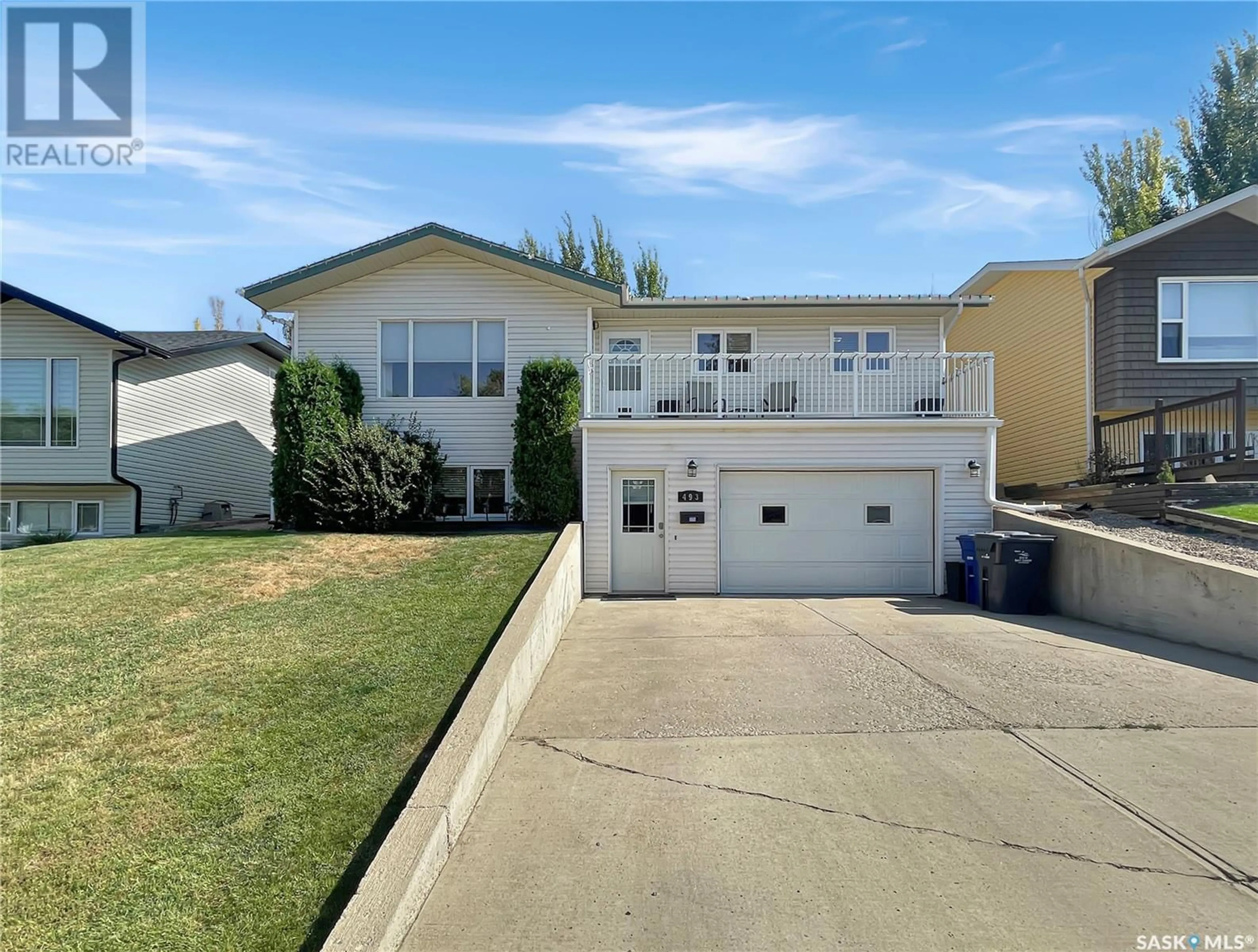 Frontside or backside of a home, the street view for 493 4th AVENUE SE, Swift Current Saskatchewan S9H5M2