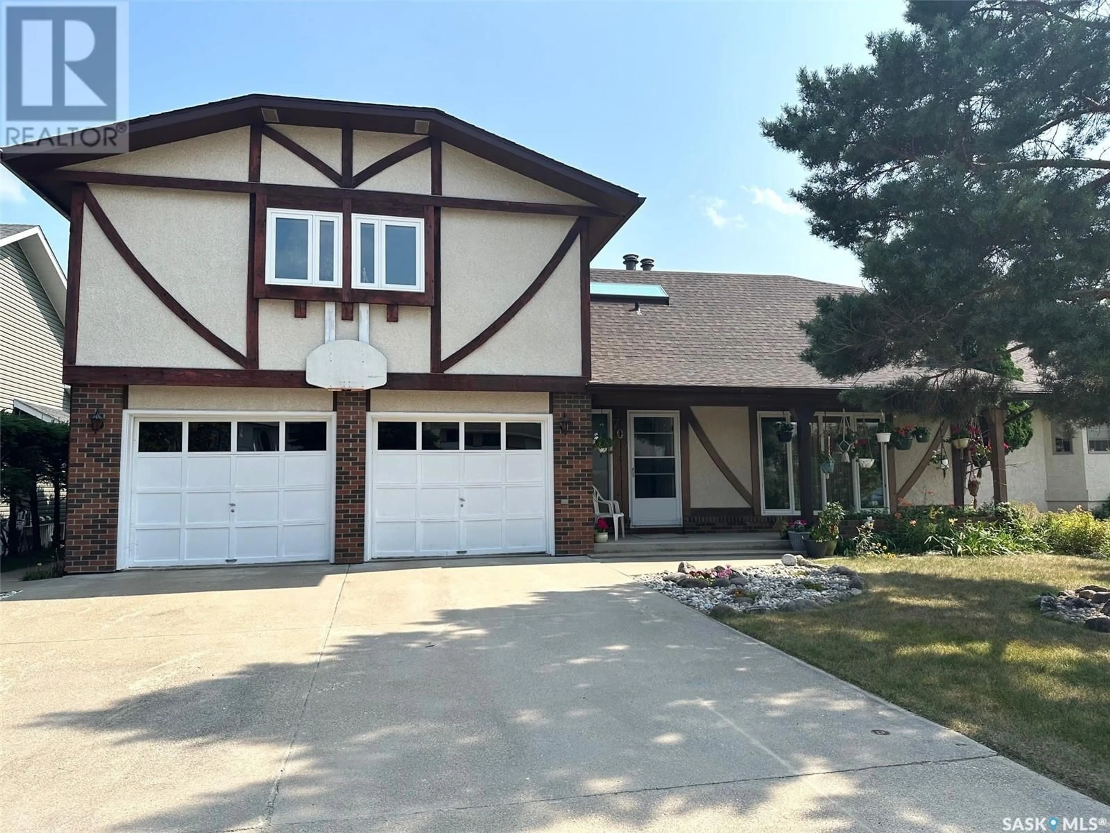 Home with vinyl exterior material for 706 Donald STREET, Hudson Bay Saskatchewan S0E0Y0