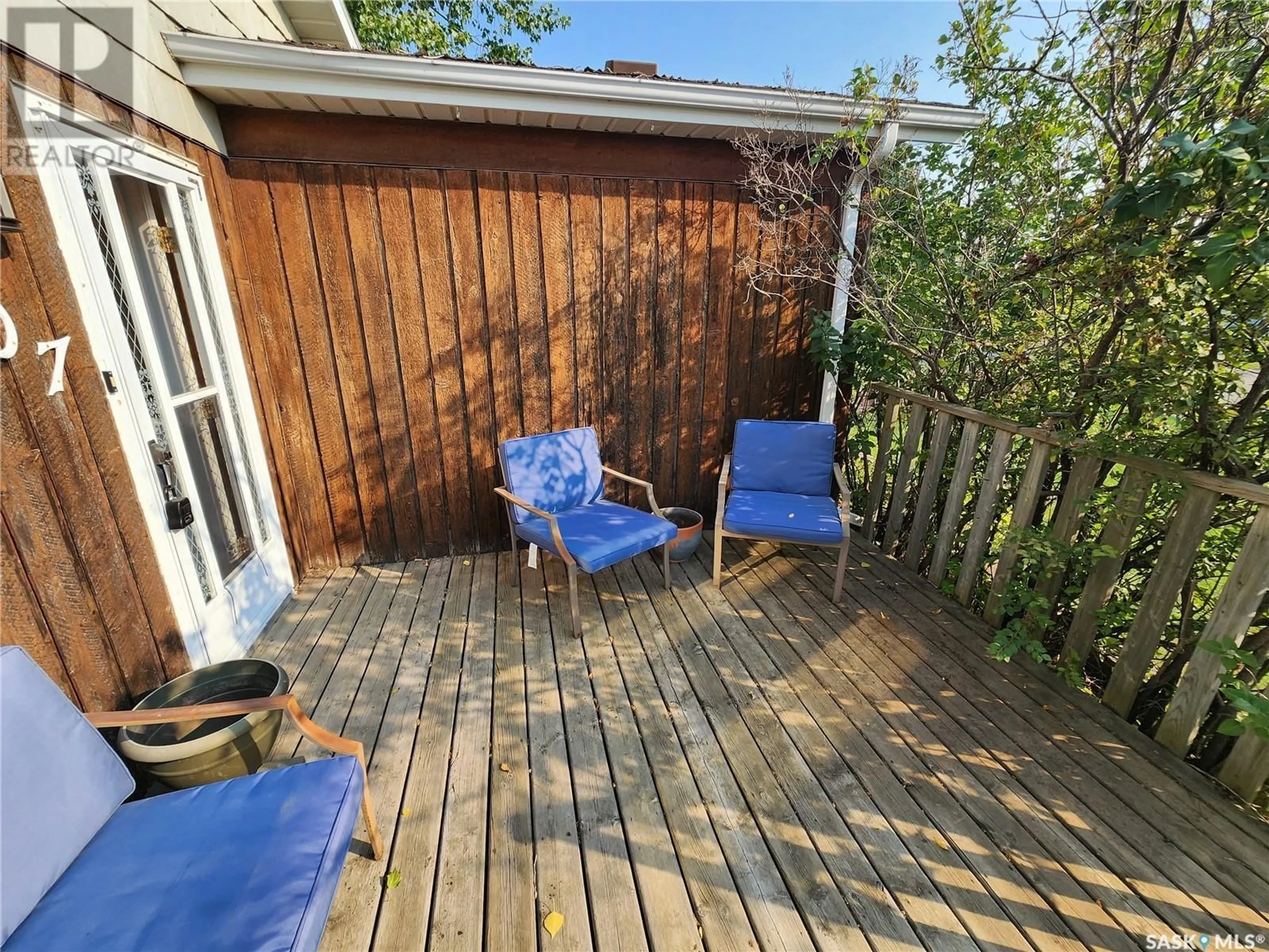 Patio, the fenced backyard for 107 18th STREET NE, Weyburn Saskatchewan S4H2W3