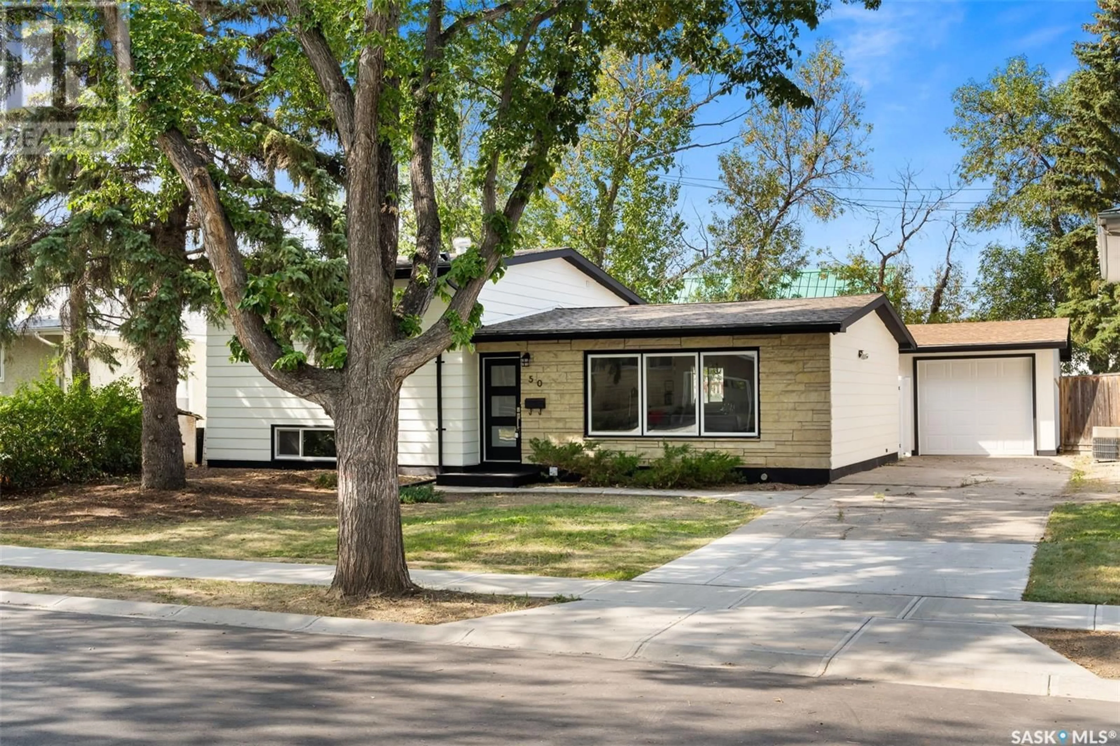 Home with vinyl exterior material for 50 Newlands STREET, Regina Saskatchewan S4S4S4