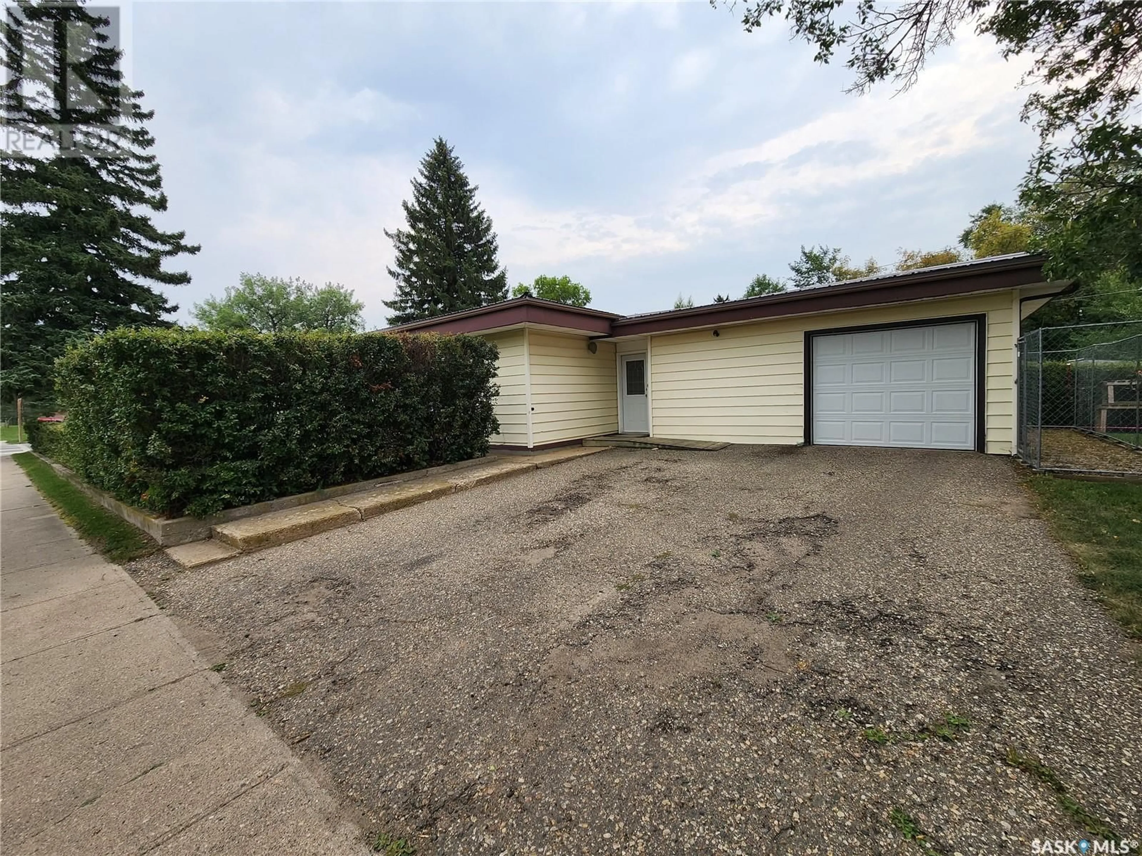 Frontside or backside of a home for 1116 COTEAU AVENUE, Weyburn Saskatchewan S4H0H6