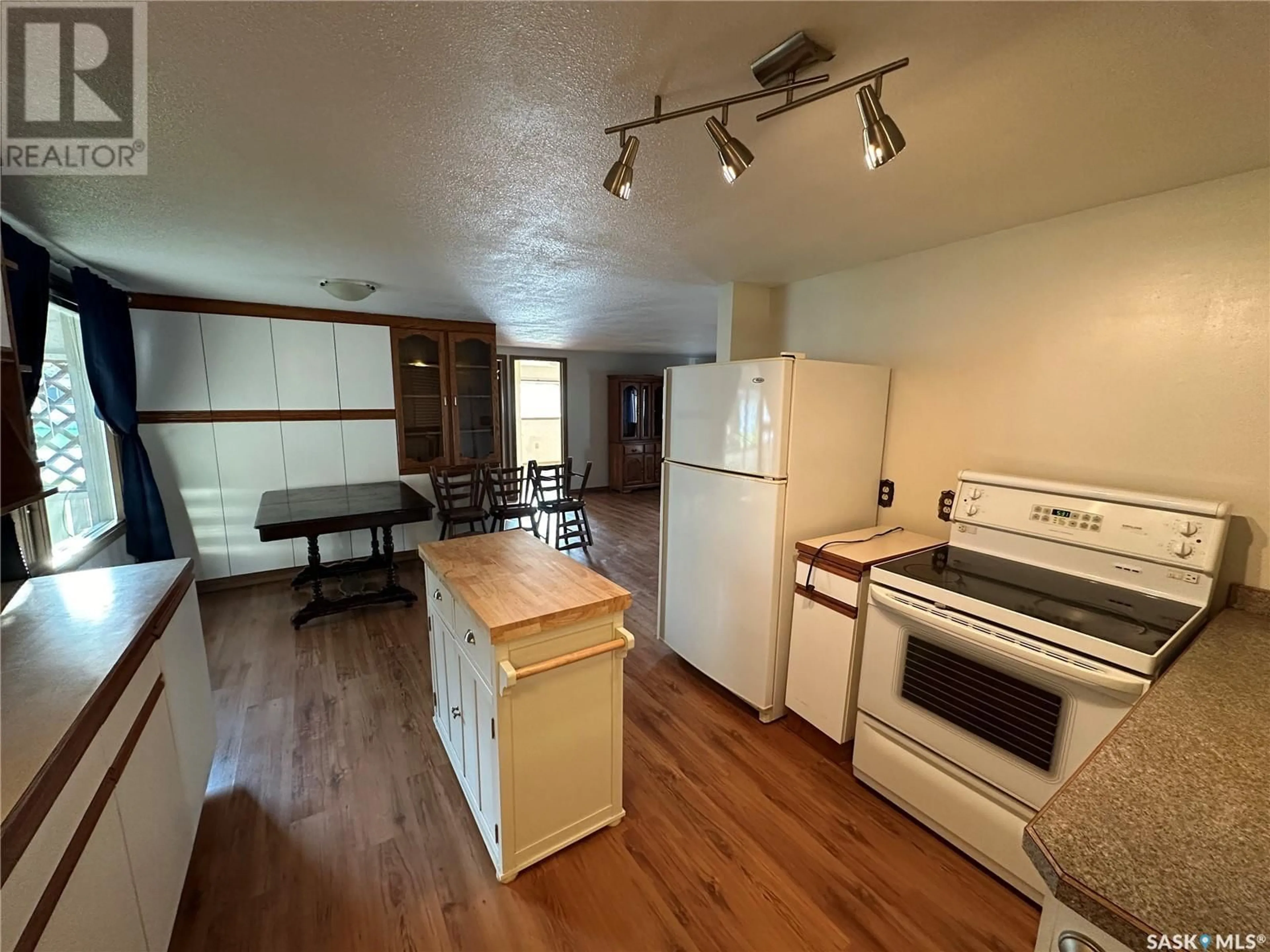 Kitchen, wood floors, cottage for 138 17th STREET, Weyburn Saskatchewan S4H2N4